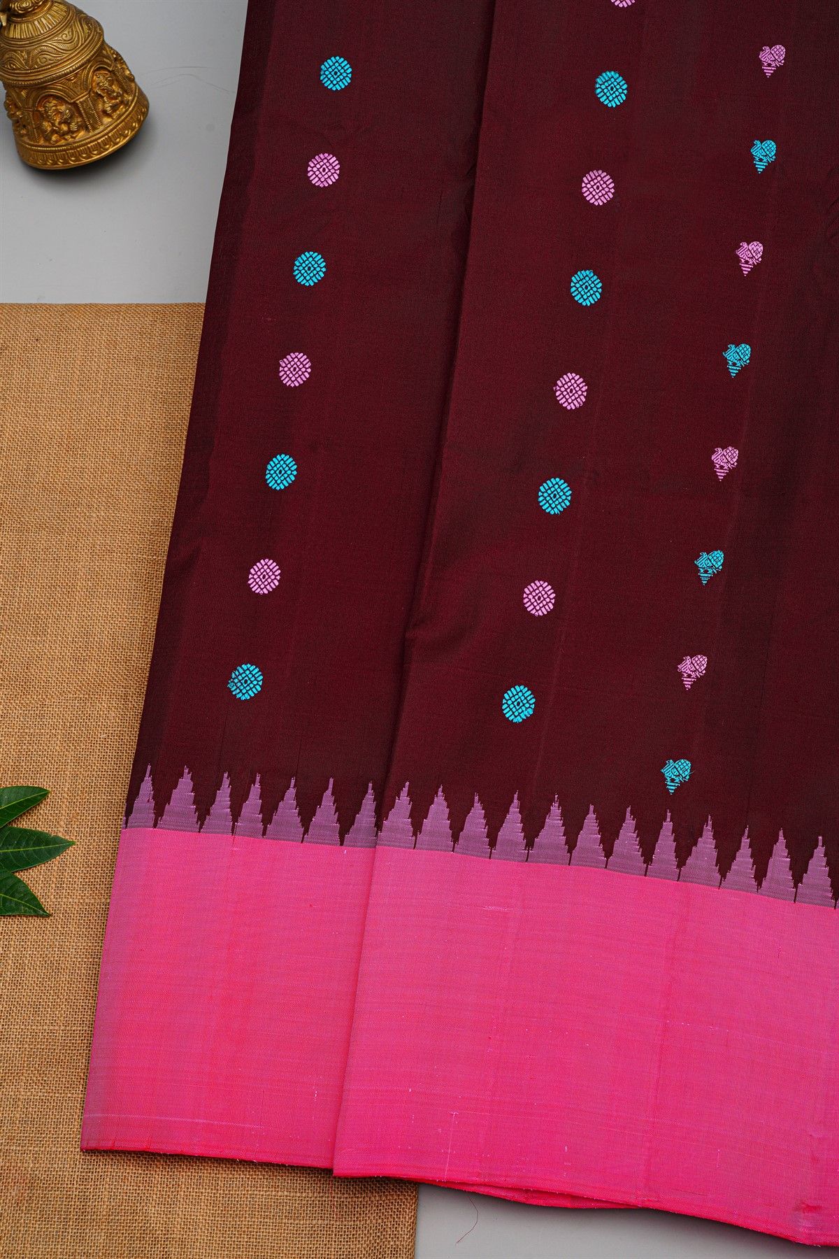 Gadwal Silk Maroon Saree With Florals And Peacock Buttis Body