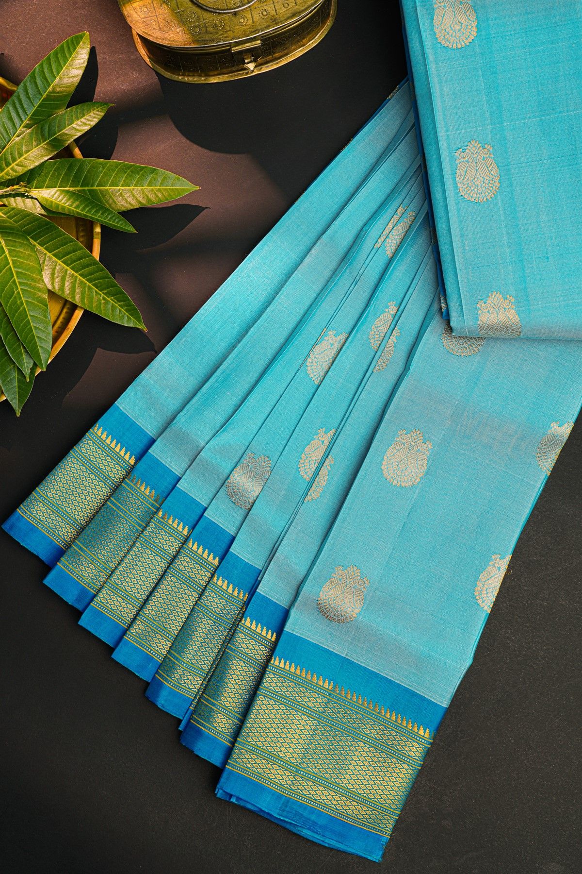 Gadwal Silk Sky Blue Saree With Florals And Peacocks In Zari Body