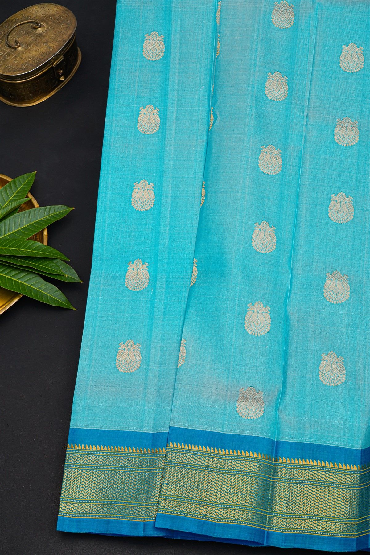 Gadwal Silk Sky Blue Saree With Florals And Peacocks In Zari Body