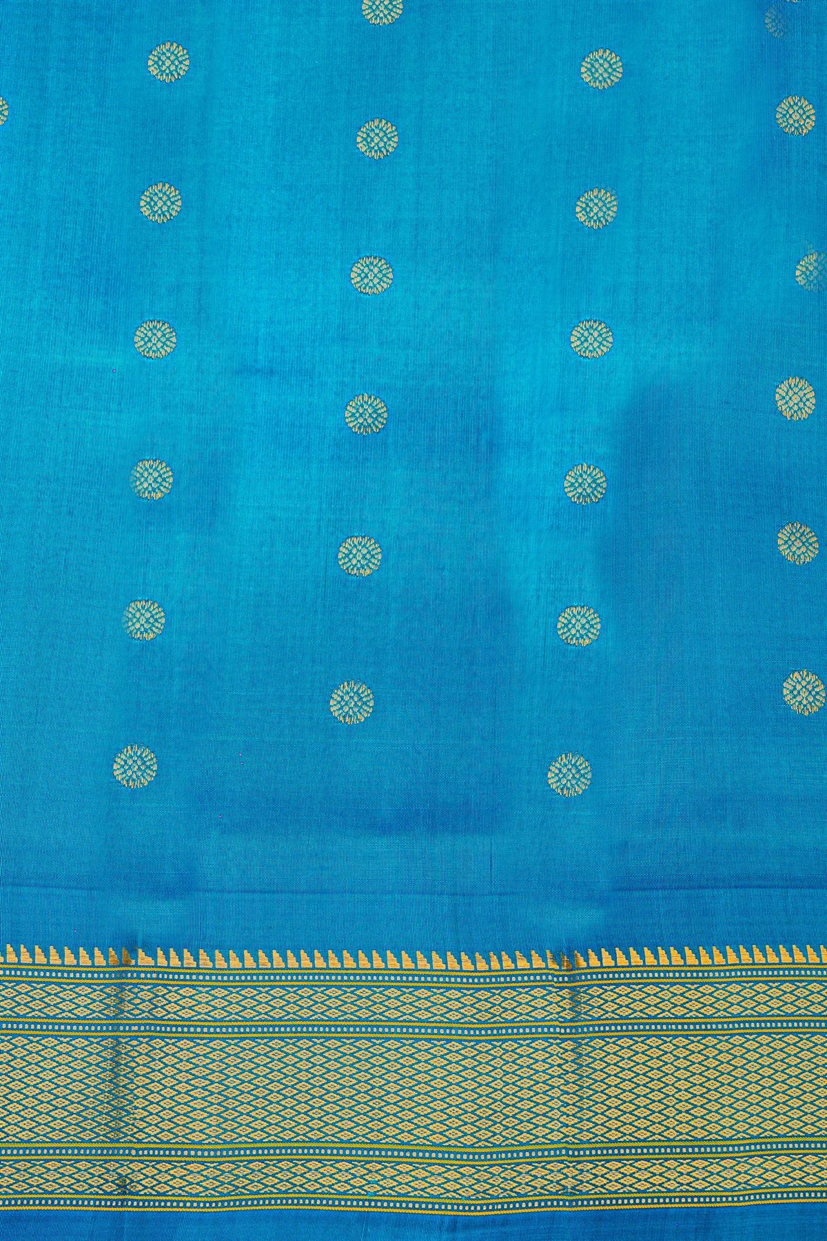 Gadwal Silk Sky Blue Saree With Florals And Peacocks In Zari Body