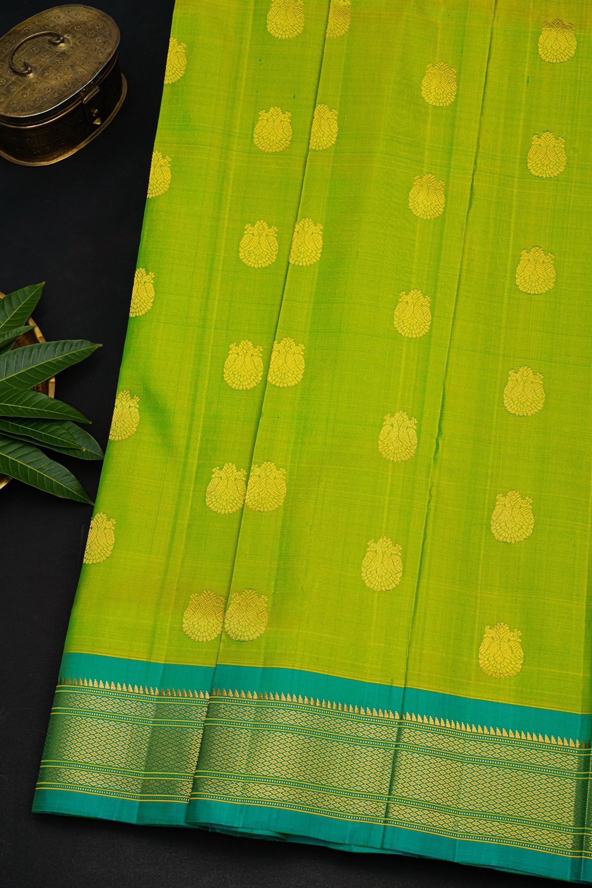 Gadwal Silk Parrot Green Saree With Florals And Peacocks In Zari Body
