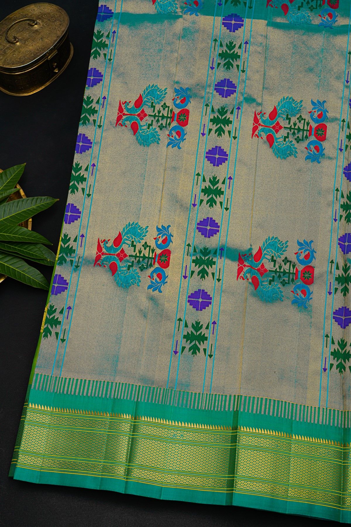 Gadwal Silk Parrot Green Saree With Florals And Peacocks In Zari Body