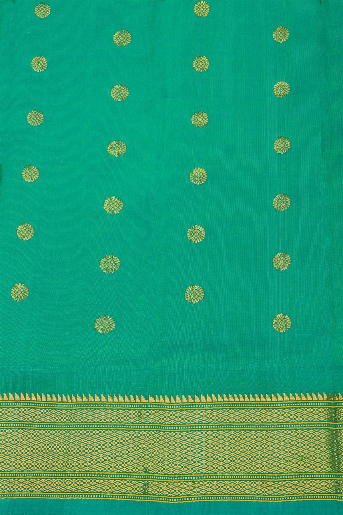 Gadwal Silk Parrot Green Saree With Florals And Peacocks In Zari Body