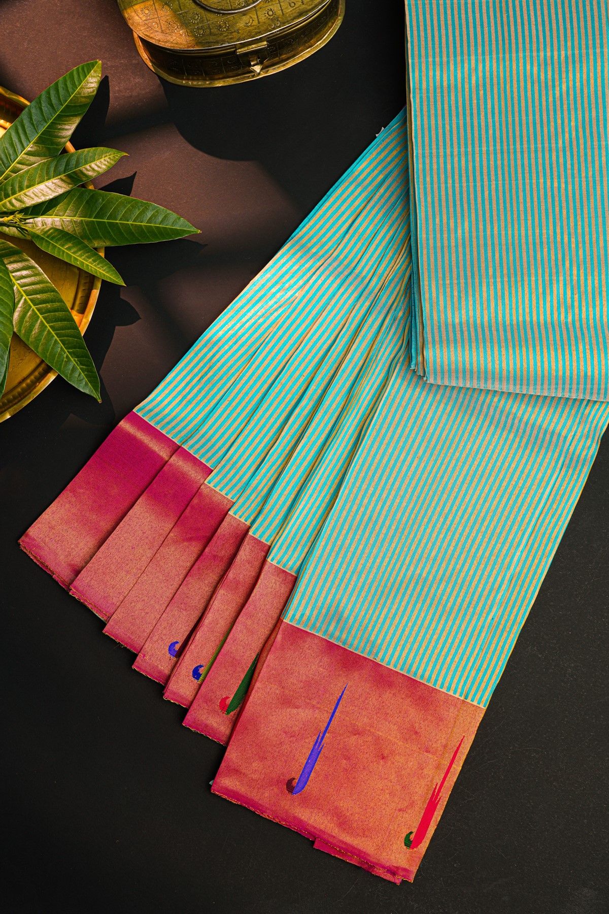 Gadwal Silk Sky Blue Saree With Single Muniya Motif Border