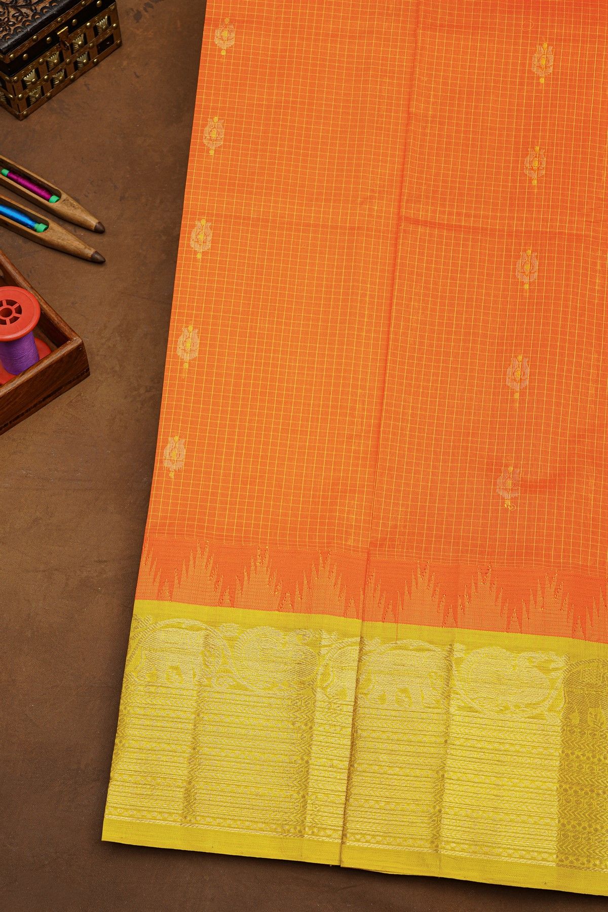 Kuppadam Sico Peach Orange Saree With Checks And Buttis Body