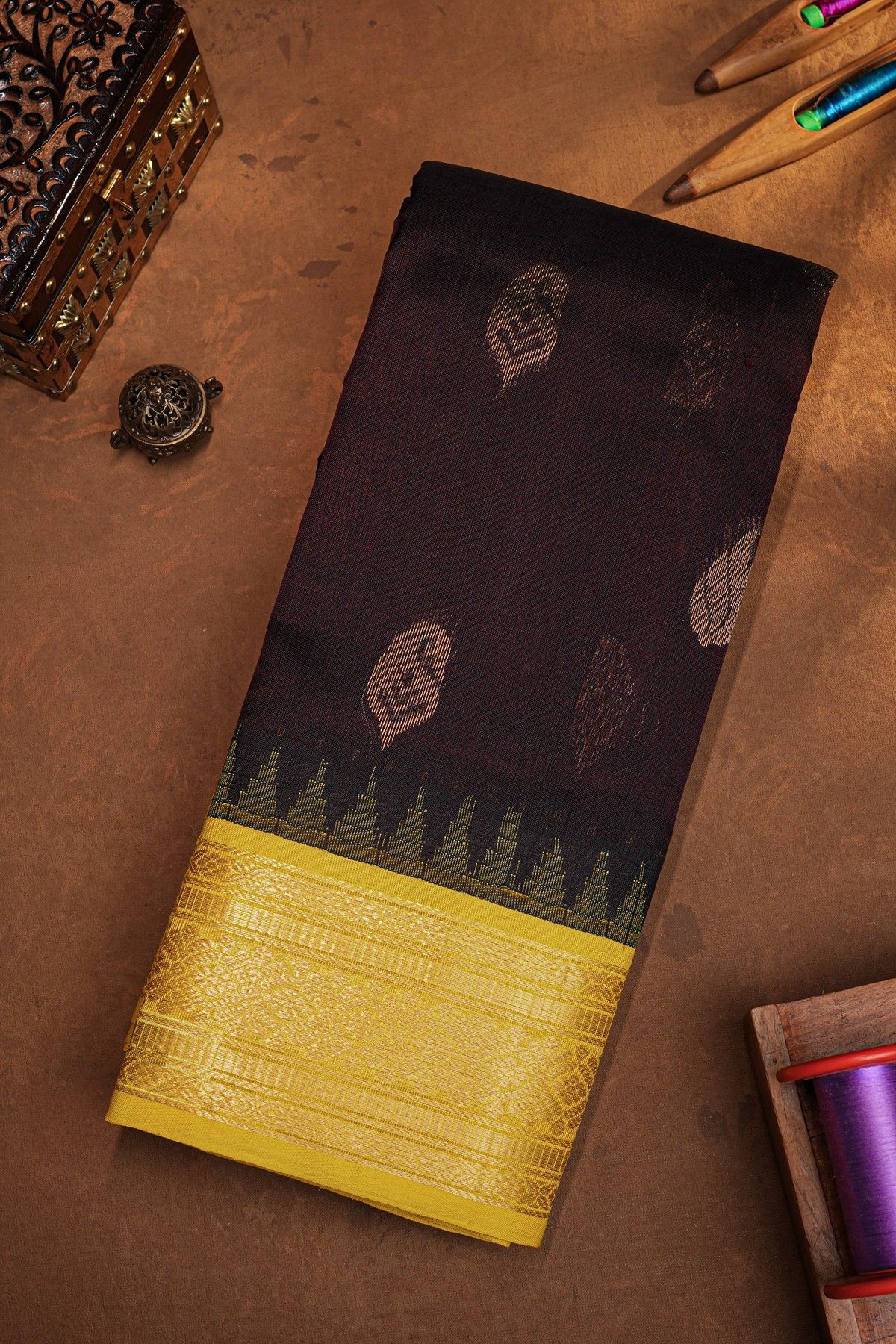 Kuppadam Sico Dark Brown Saree With Florals Leaves And Temple Border