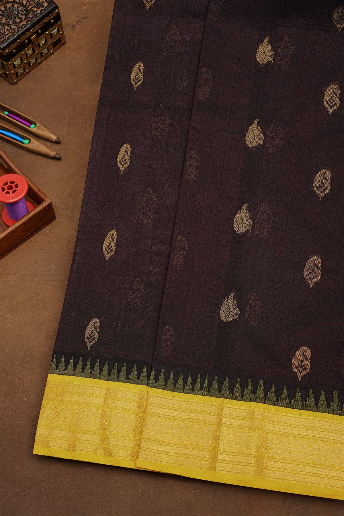 Kuppadam Sico Dark Brown Saree With Florals Leaves And Temple Border