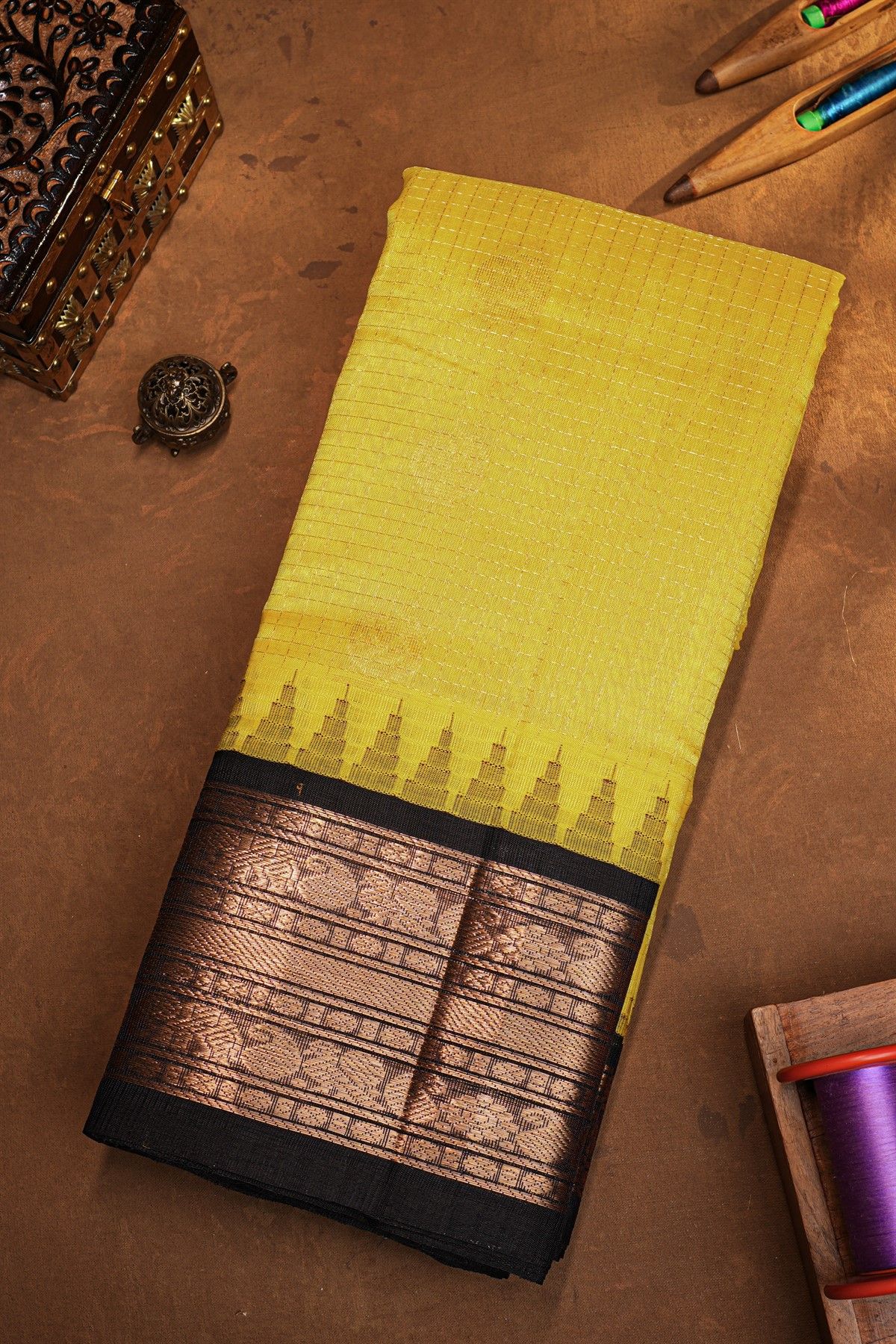Kuppadam Sico Yellow Saree With Florals And Paisley Buttis Body