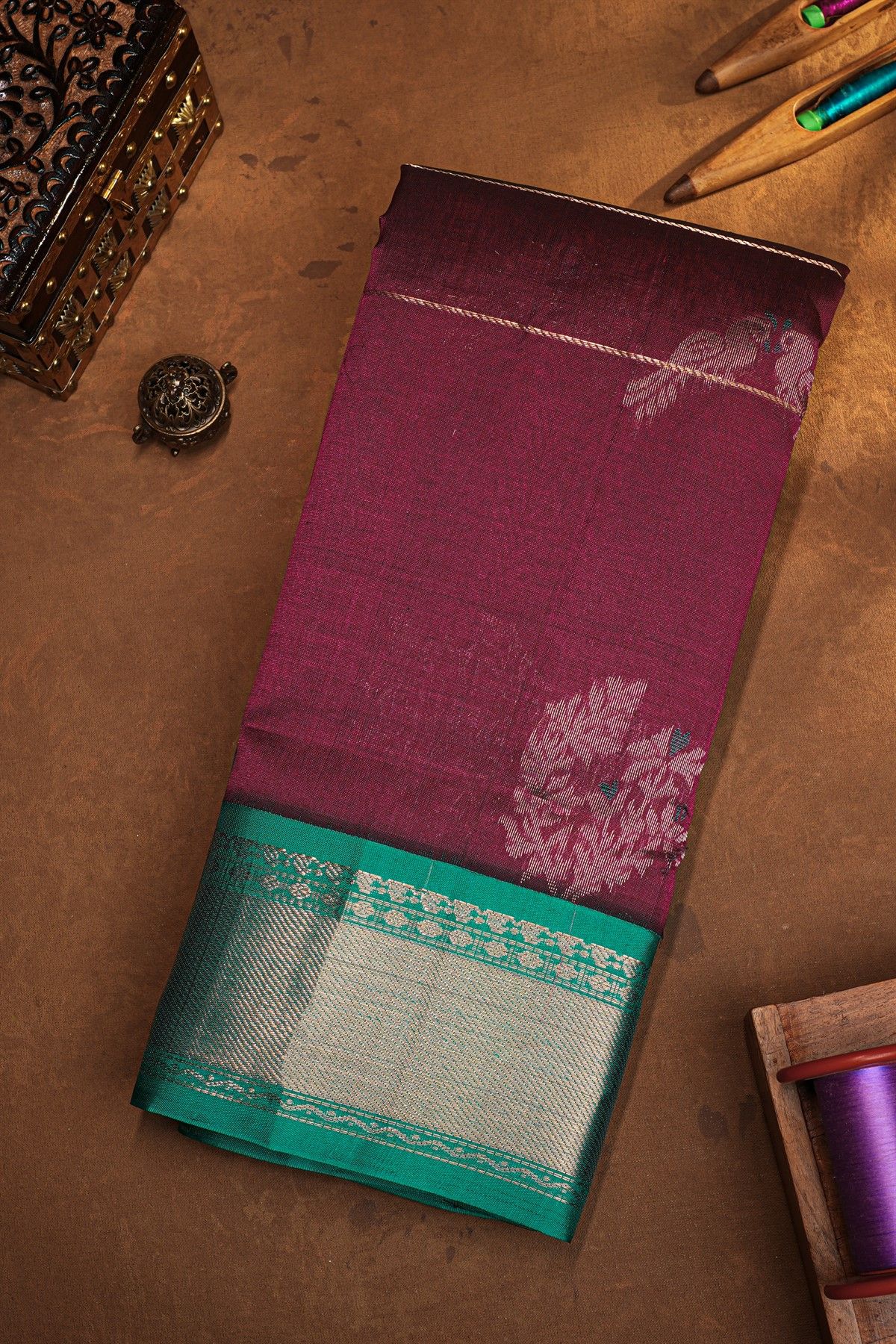 Kuppadam Sico Wine Saree With Floral And Parrot Butti Body