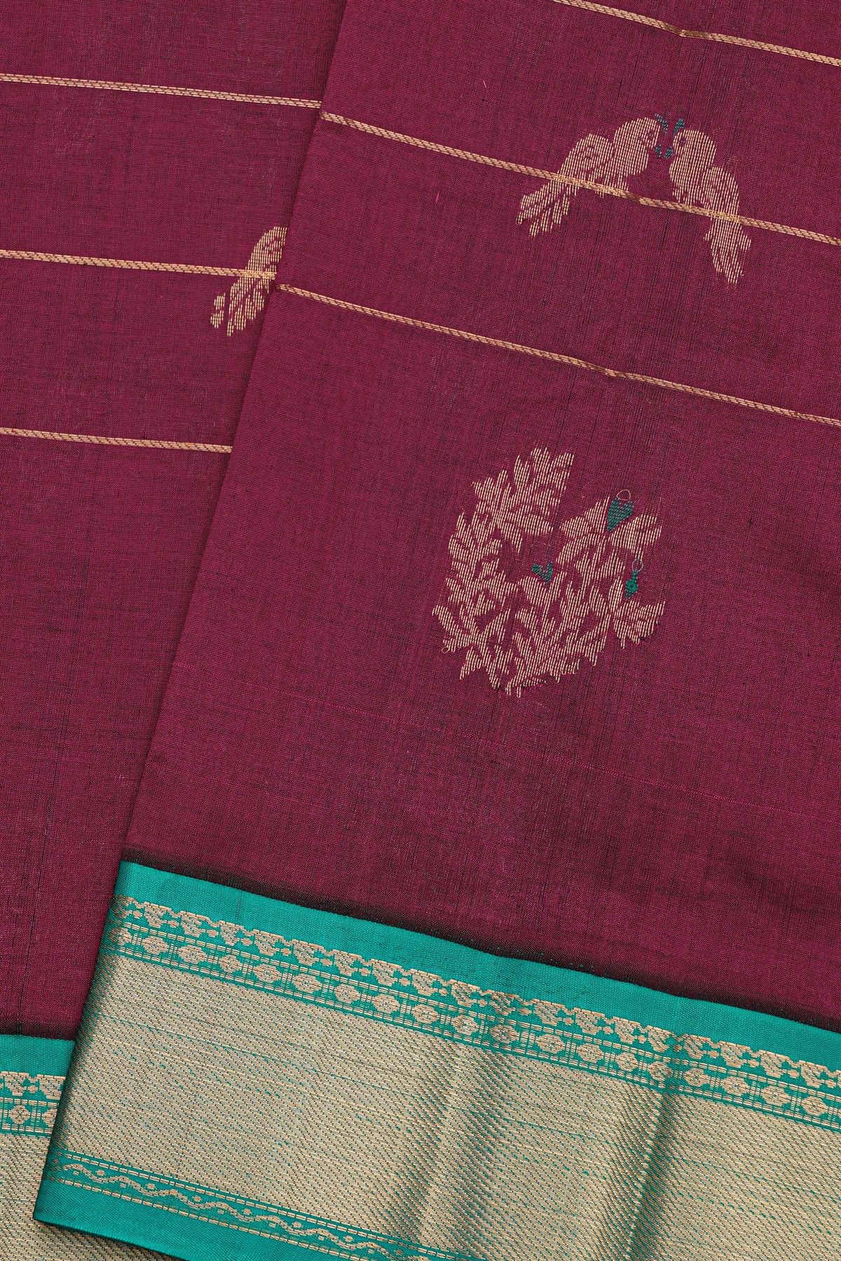 Kuppadam Sico Wine Saree With Floral And Parrot Butti Body