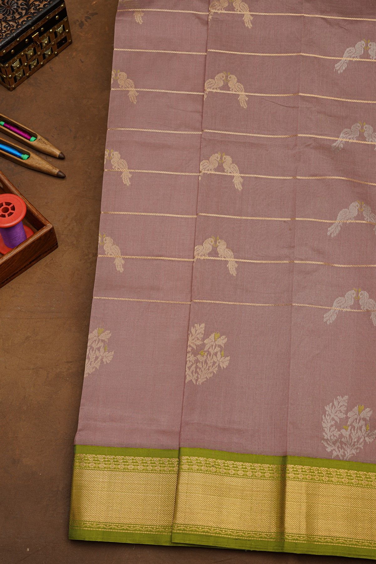 Kuppadam Sico Mauve Saree With Floral And Parrot Butti Body