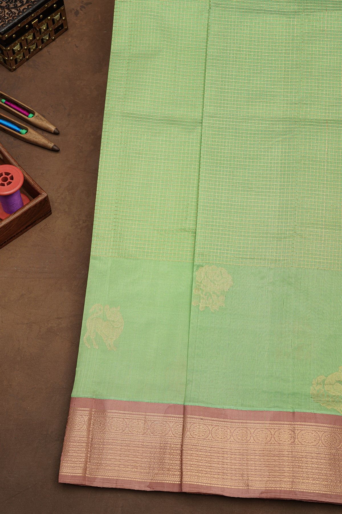 Kuppadam Sico Mint Green Saree With Floral And Buttis In Zari Work Border