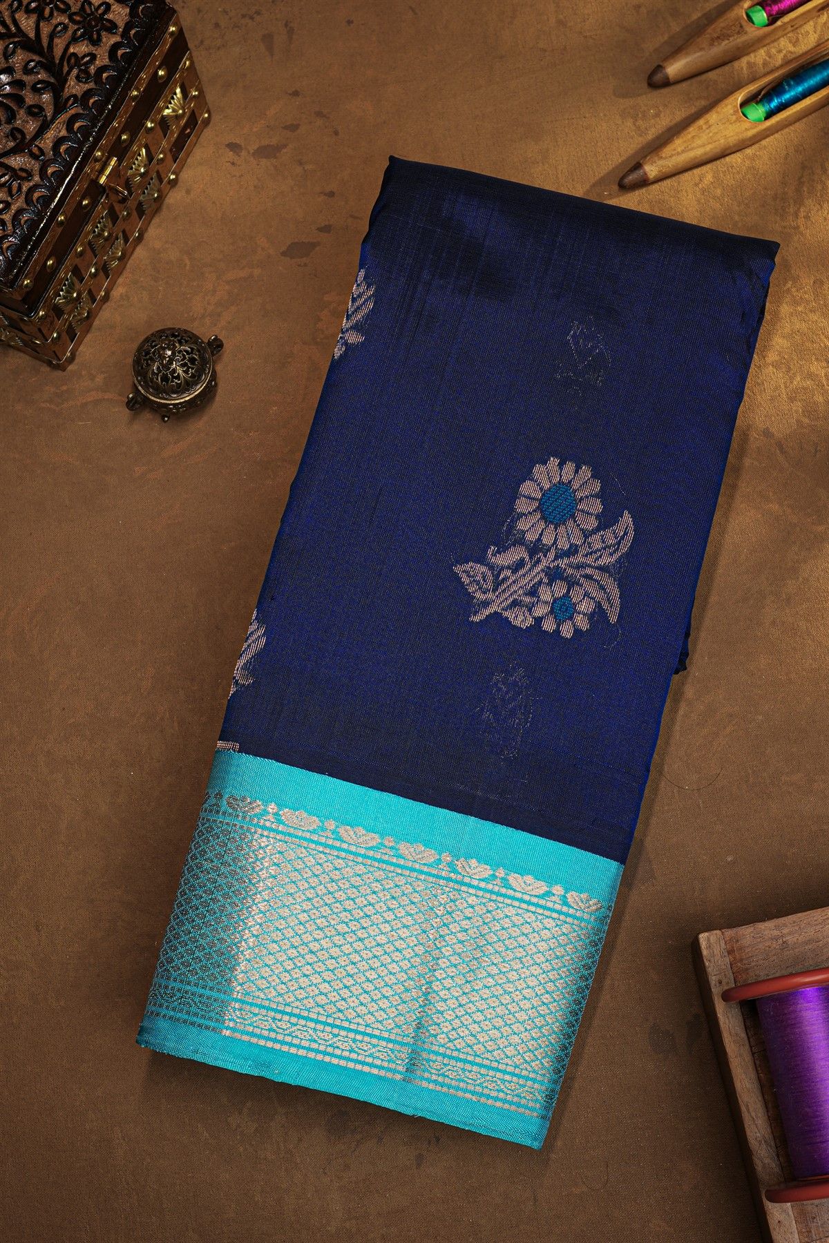 Kuppadam Sico Blue Saree With Floral And Butti Body