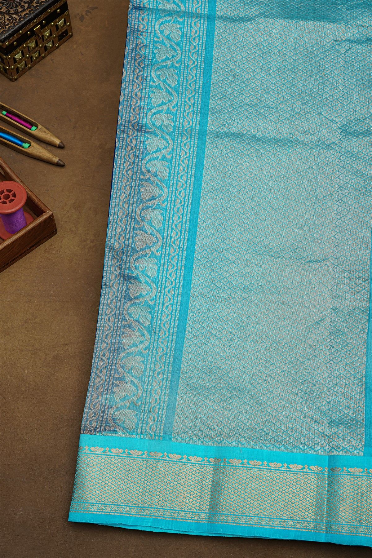 Kuppadam Sico Blue Saree With Floral And Butti Body