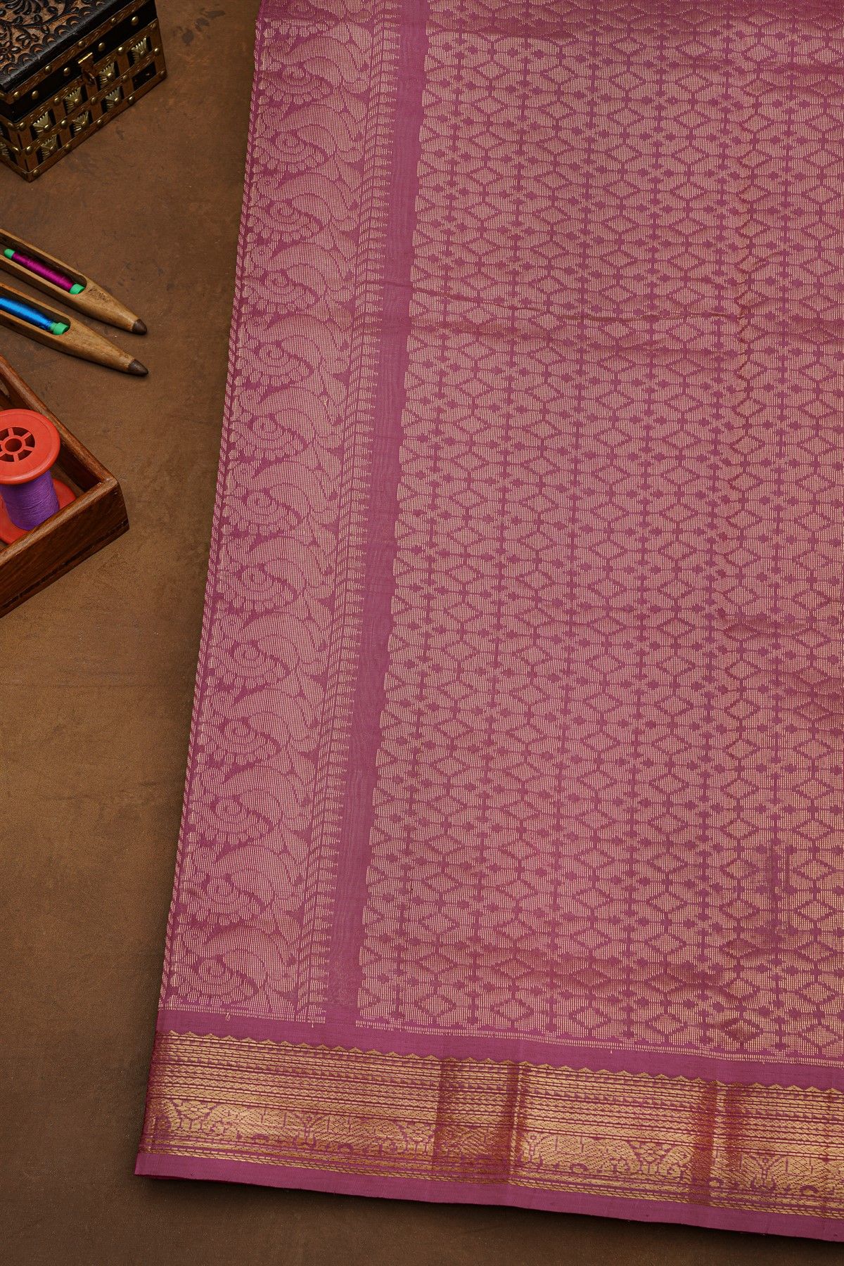 Kuppadam Sico Beige Saree Showcasing Floral And Elephant Border
