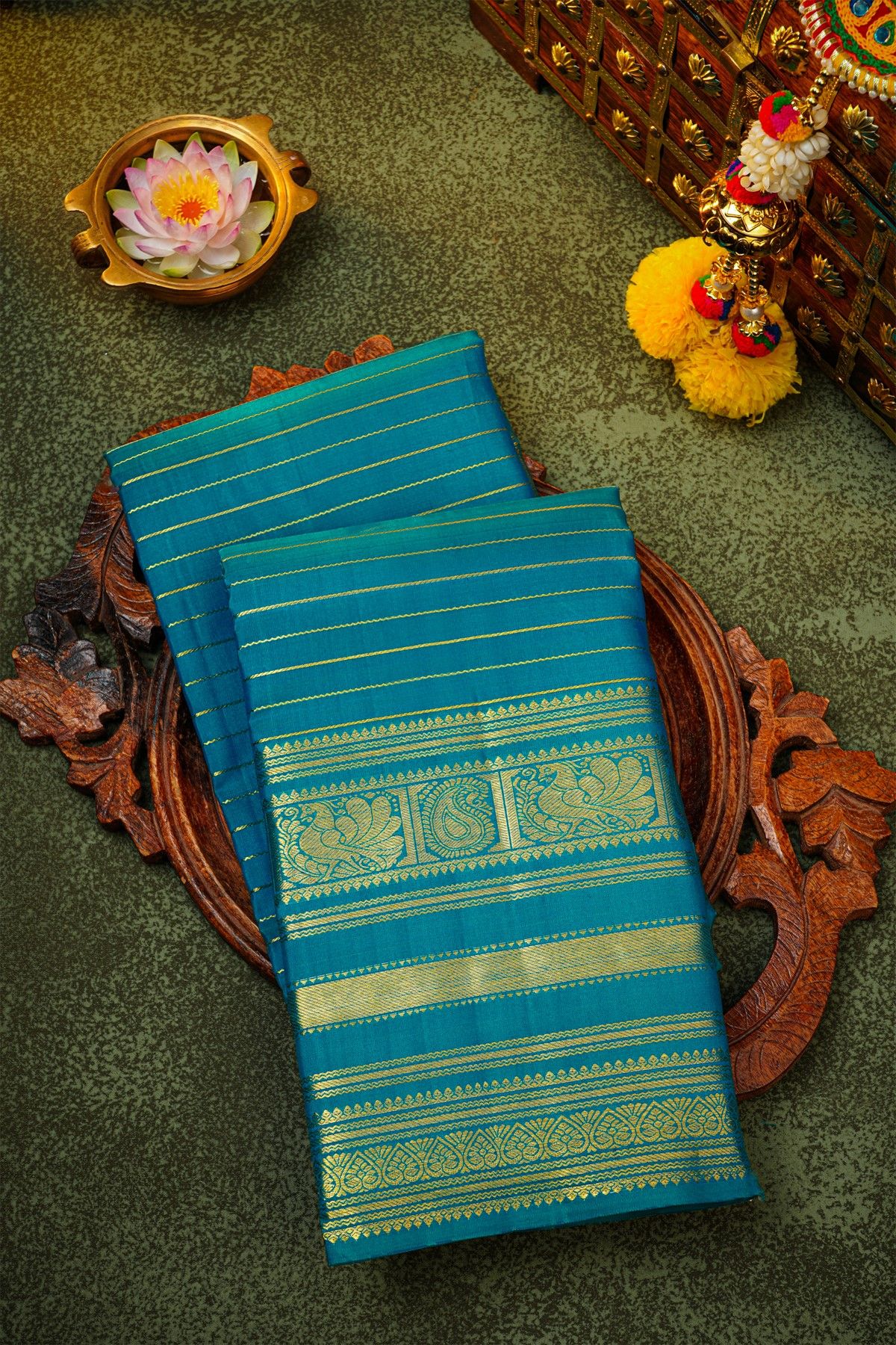 Kancheepuram Silk Peacock Blue Saree With Florals And Peacocks Border