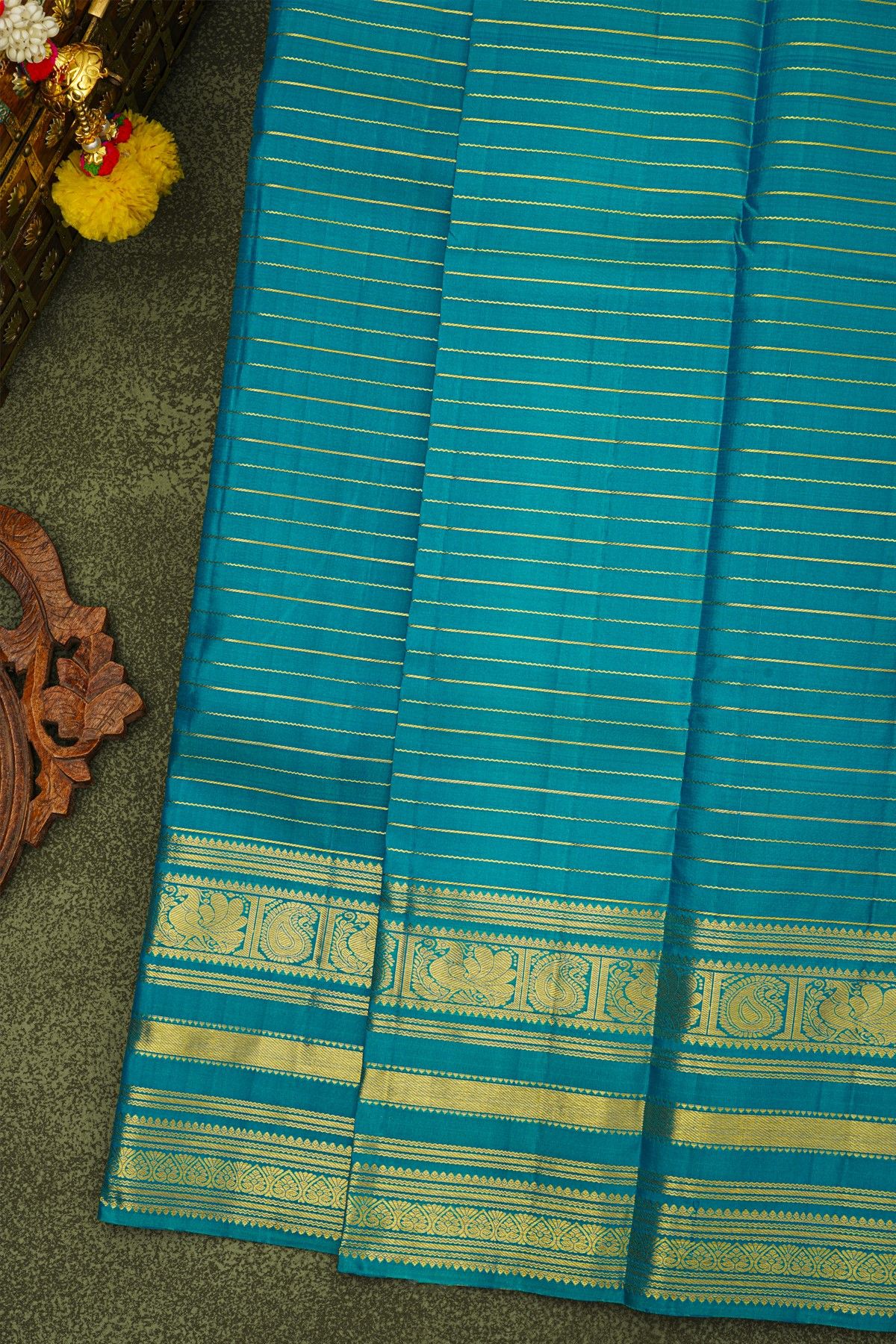 Kancheepuram Silk Peacock Blue Saree With Florals And Peacocks Border