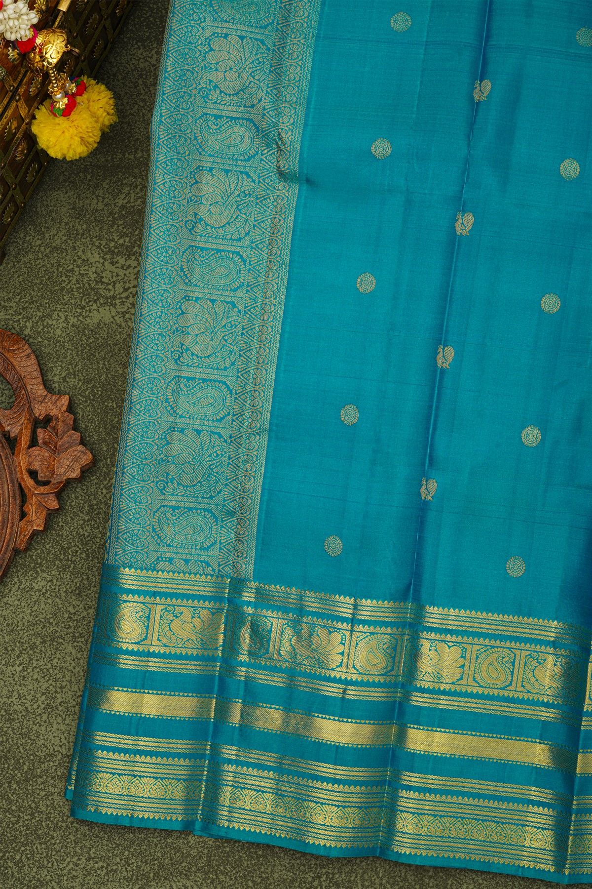 Kancheepuram Silk Peacock Blue Saree With Florals And Peacocks Border