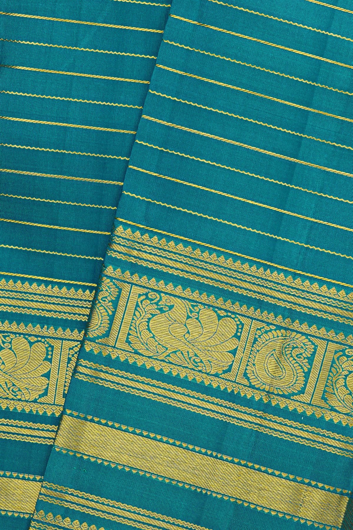 Kancheepuram Silk Peacock Blue Saree With Florals And Peacocks Border