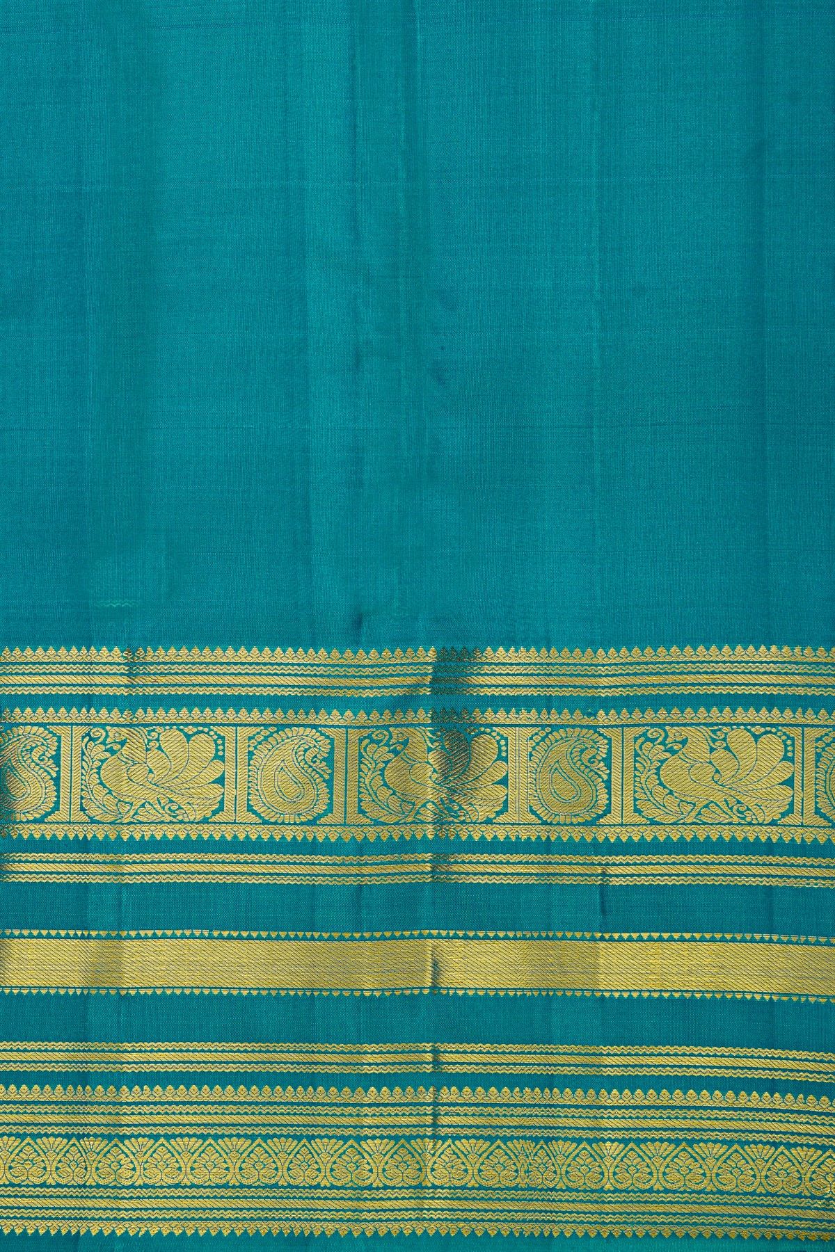 Kancheepuram Silk Peacock Blue Saree With Florals And Peacocks Border