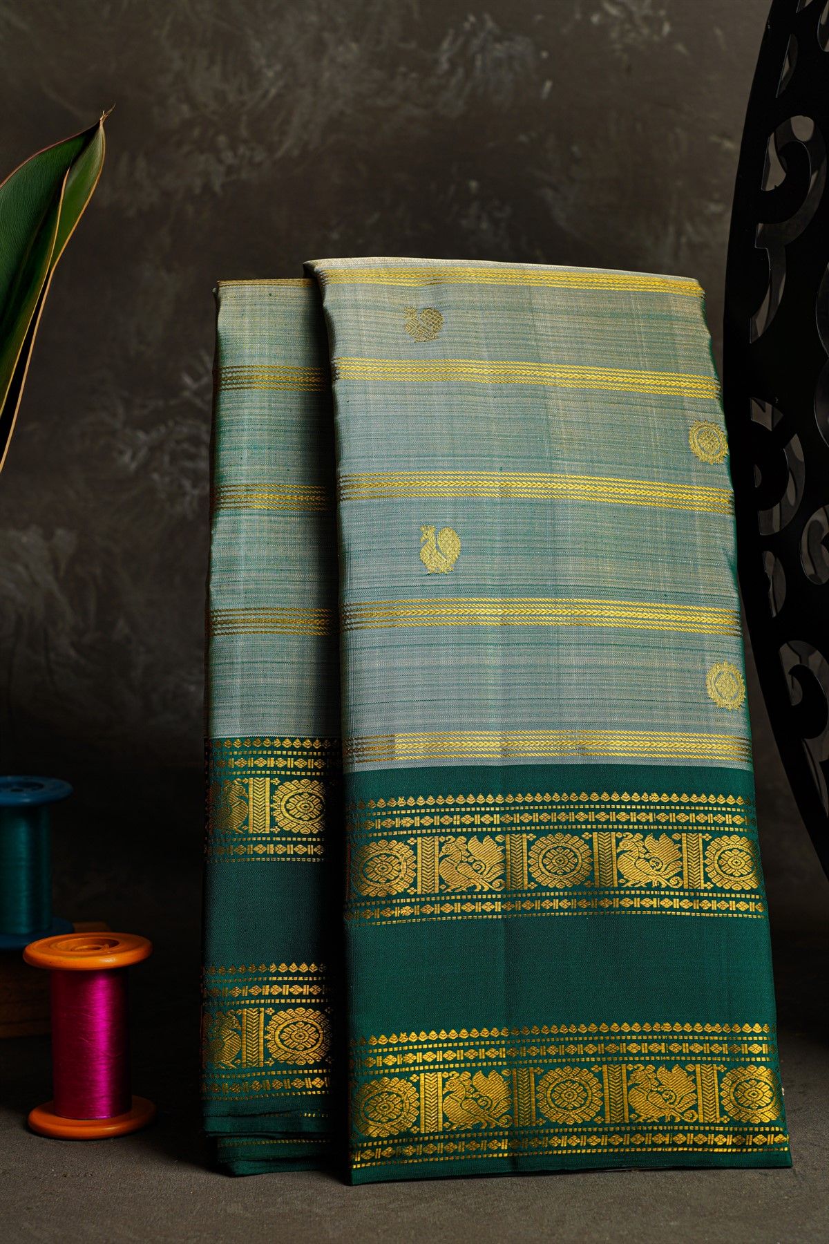 Kancheepuram Silk Sea Green Saree With Zari Lines And Peacock Buttis Body