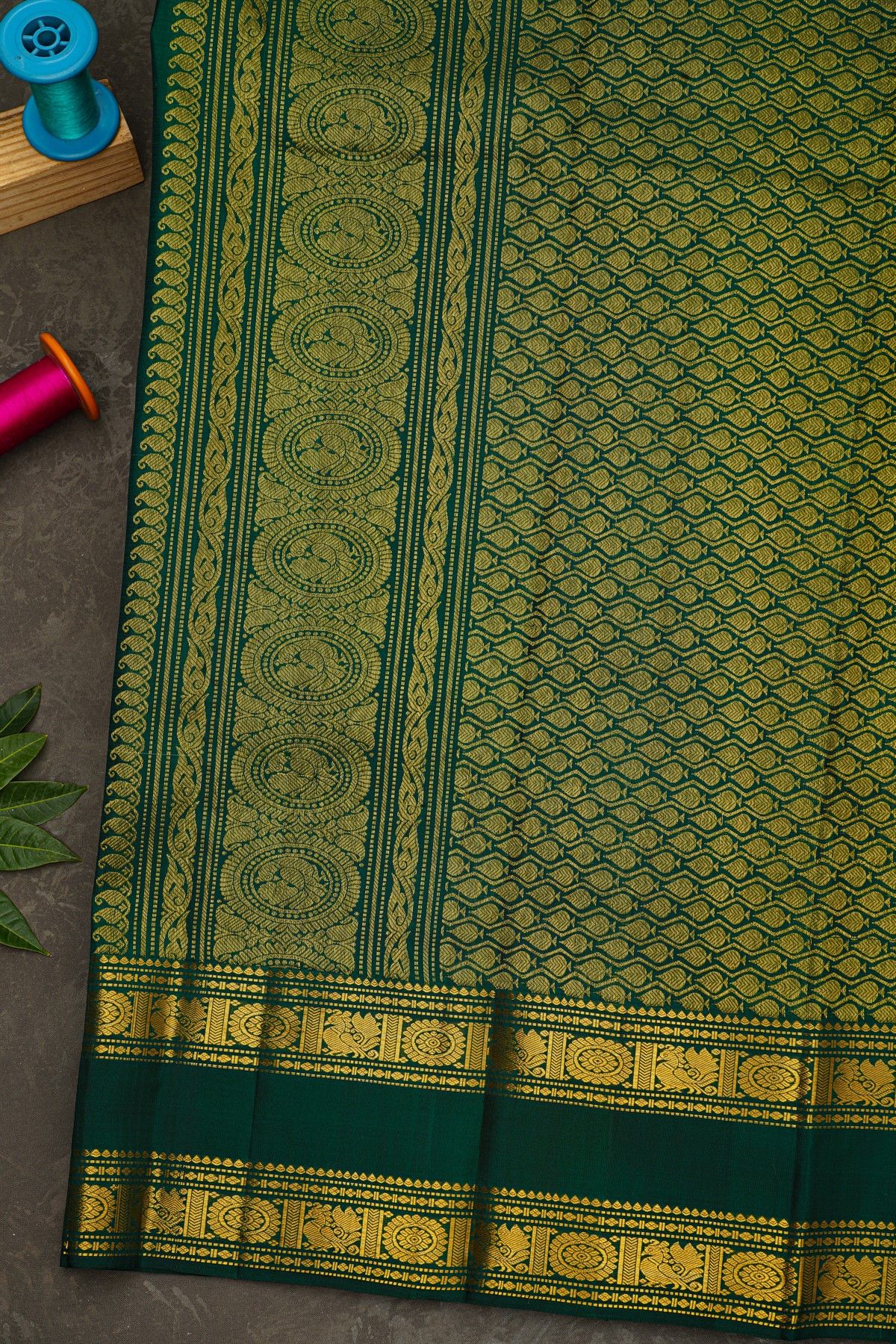 Kancheepuram Silk Sea Green Saree With Zari Lines And Peacock Buttis Body