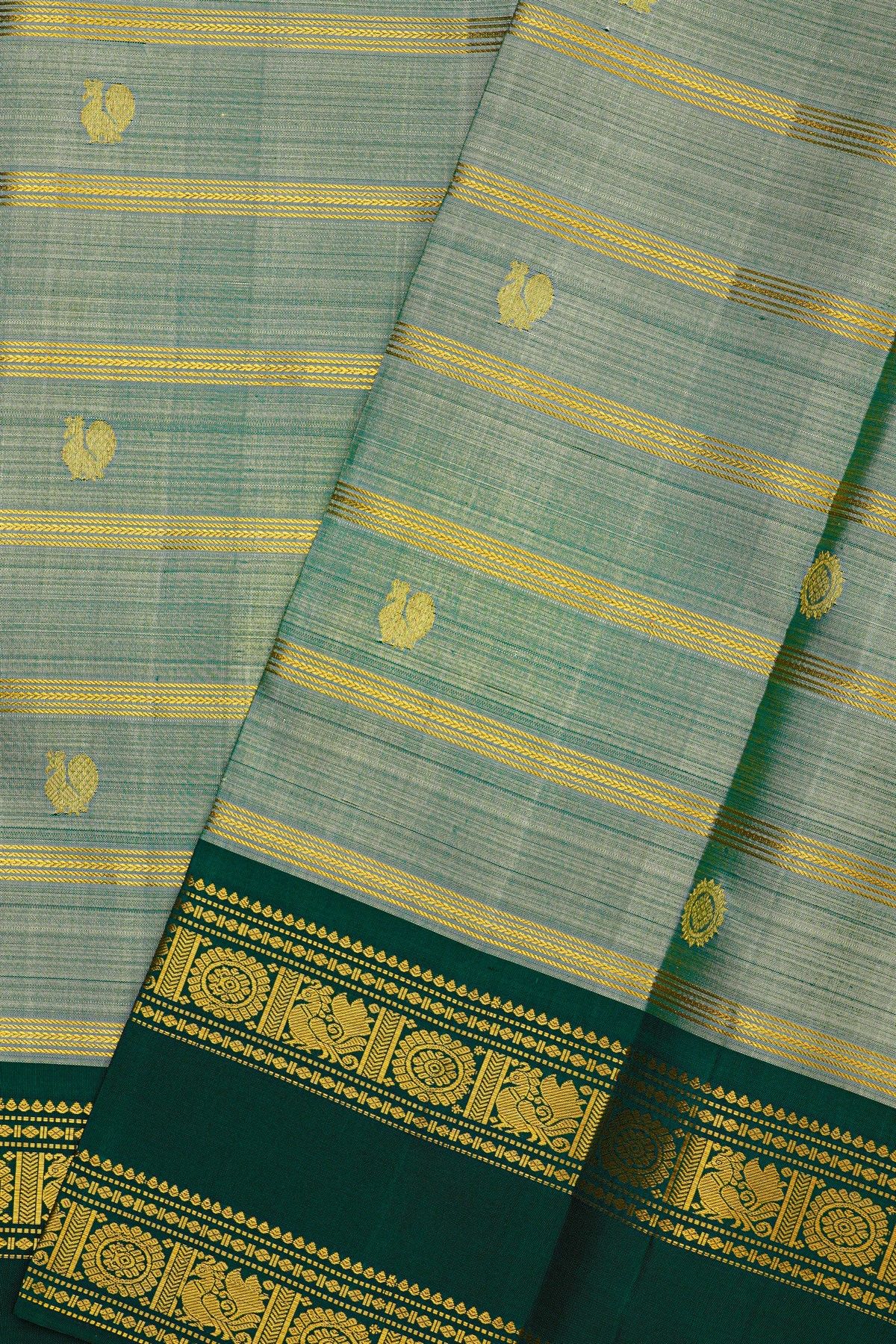 Kancheepuram Silk Sea Green Saree With Zari Lines And Peacock Buttis Body