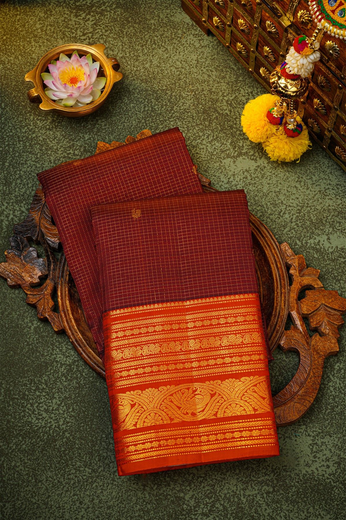 Kancheepuram Silk Maroon Saree With Zari Checks Florals And Peacock Buttis Body