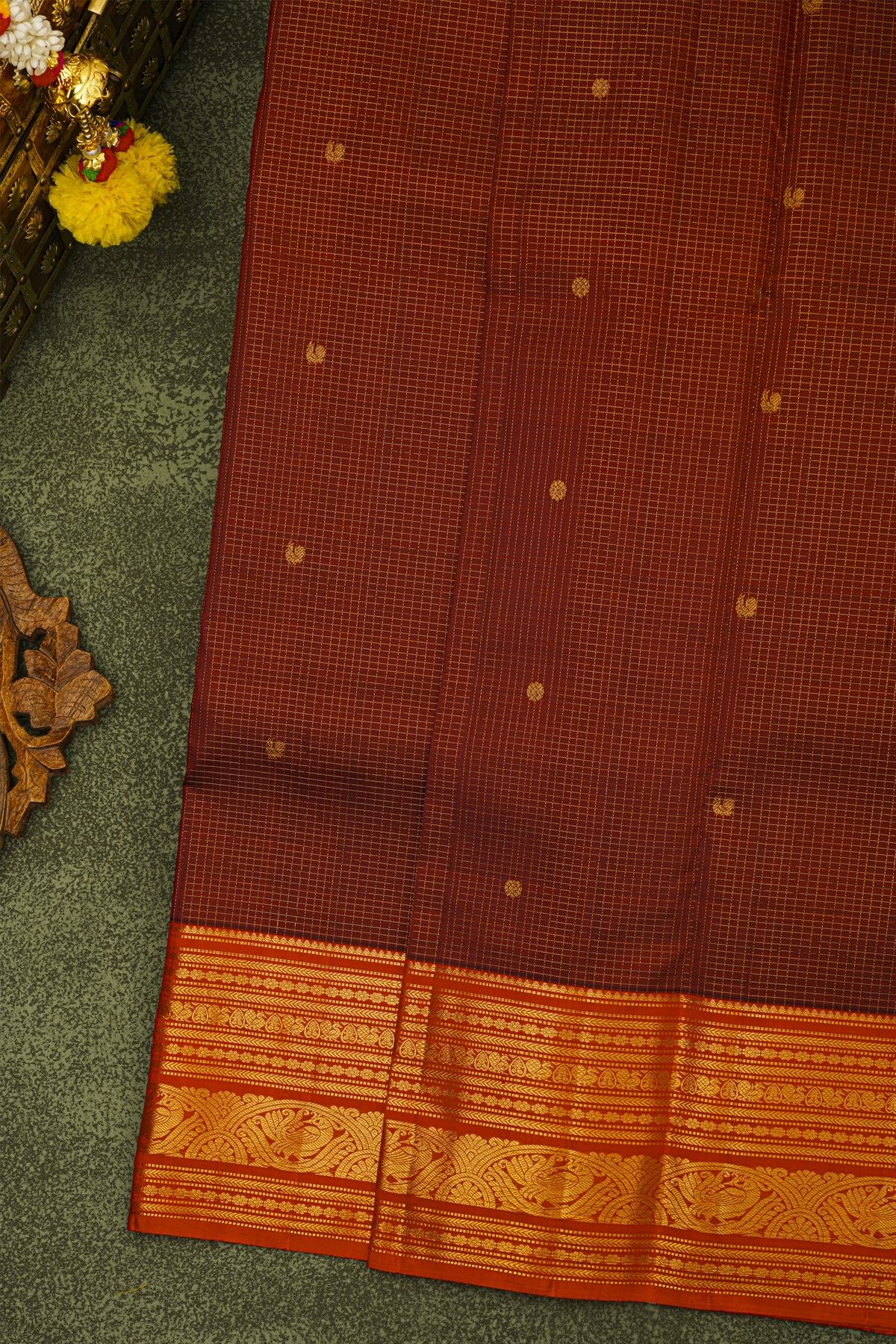 Kancheepuram Silk Maroon Saree With Zari Checks Florals And Peacock Buttis Body