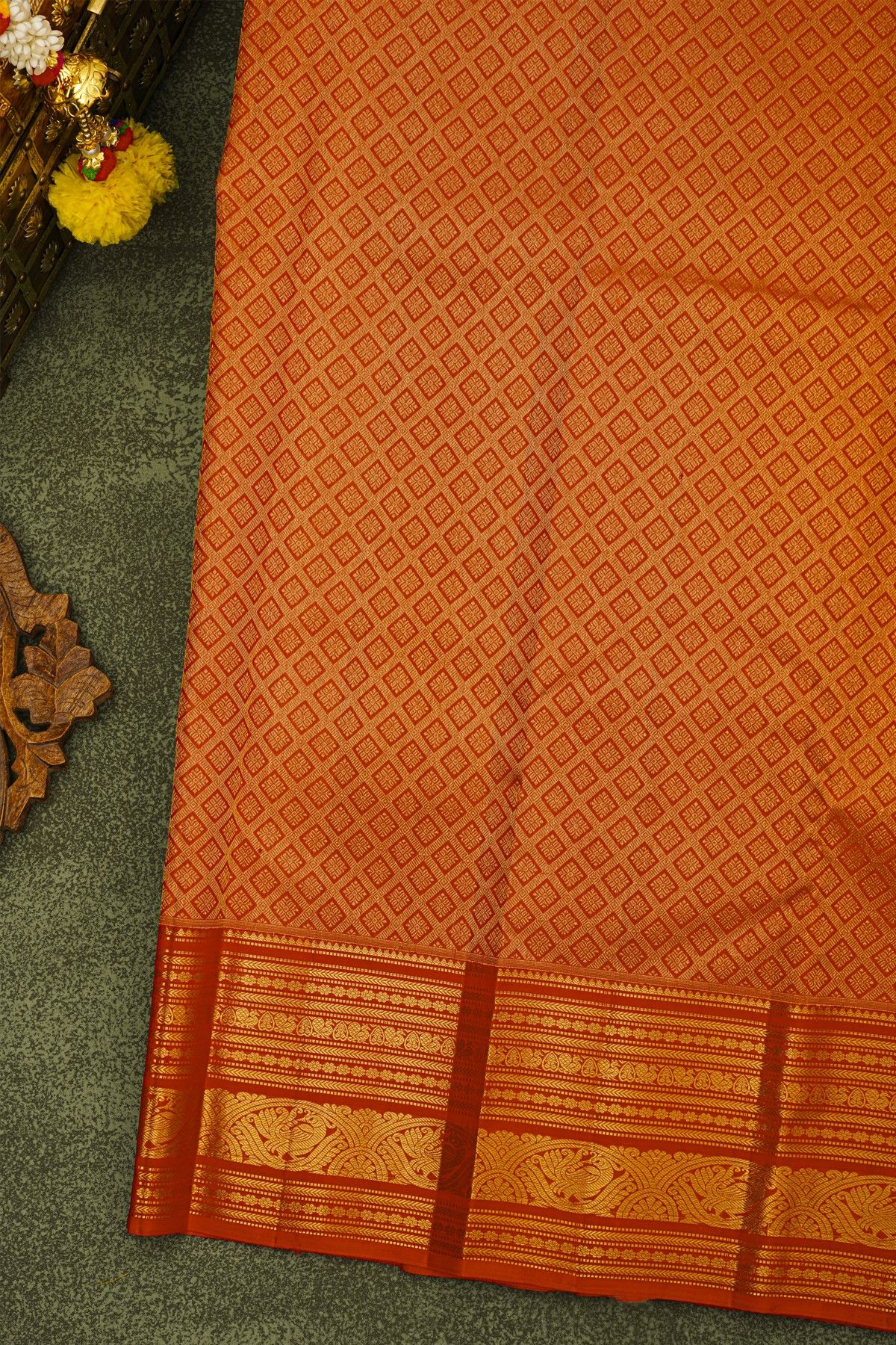 Kancheepuram Silk Maroon Saree With Zari Checks Florals And Peacock Buttis Body