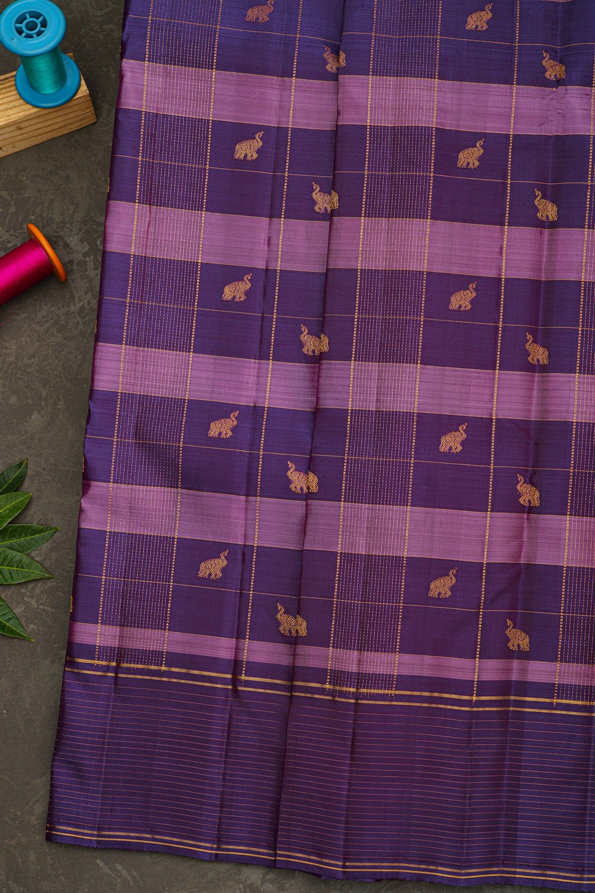 Kancheepuram Silk Violet Saree With Zari Checks And Elephant Buttis Body