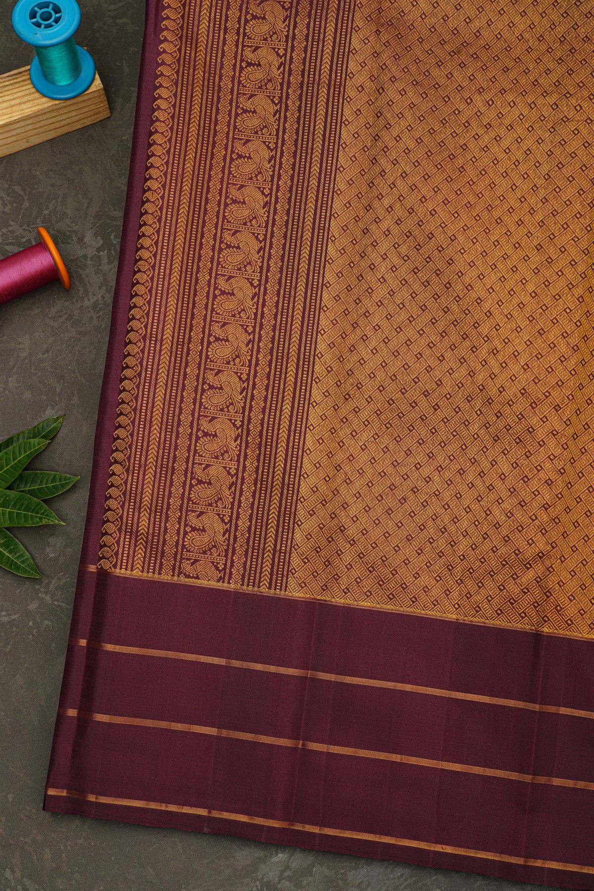 Kancheepuram Silk Bottle Green Saree With Floral And Elephant Buttis Body