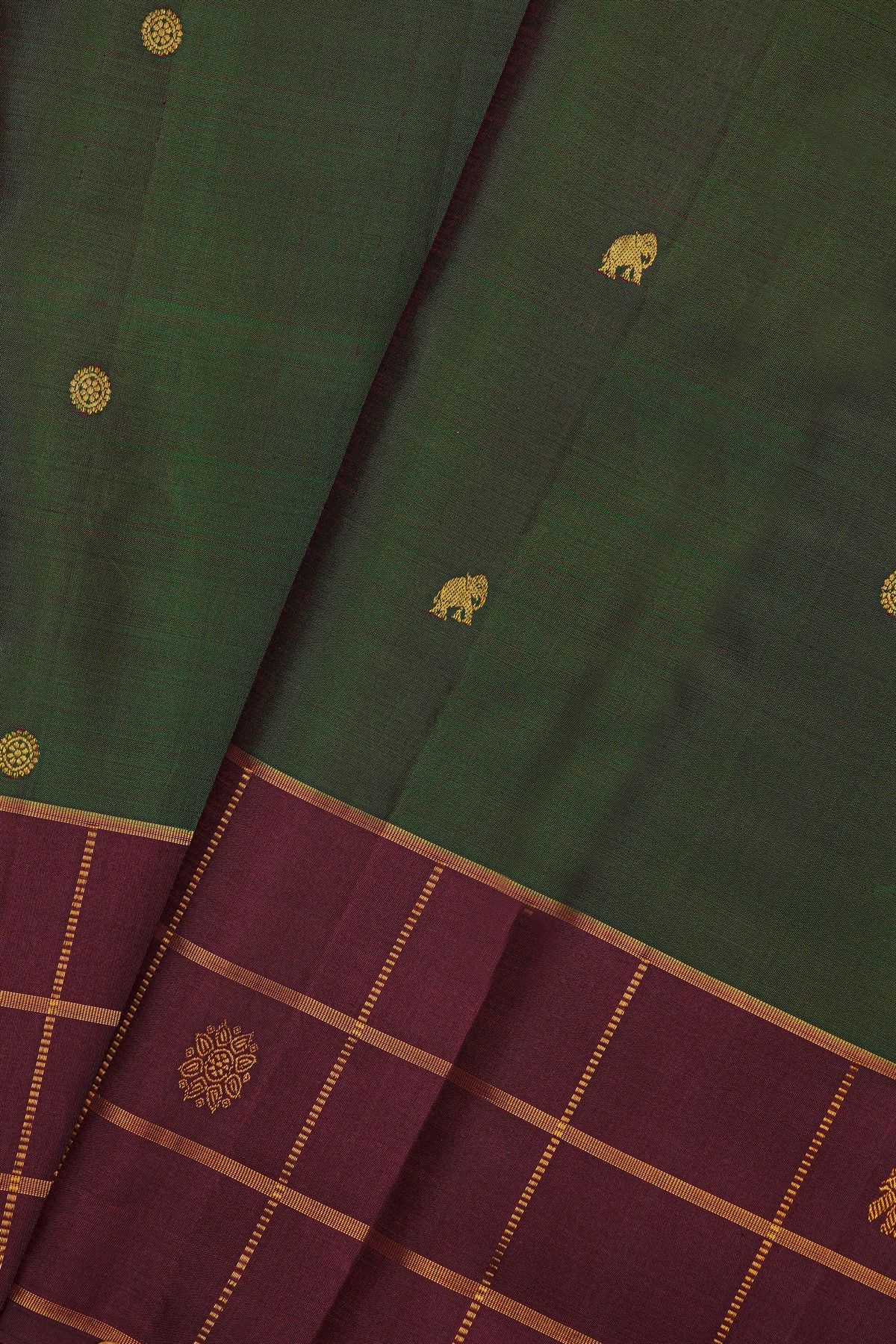 Kancheepuram Silk Bottle Green Saree With Floral And Elephant Buttis Body