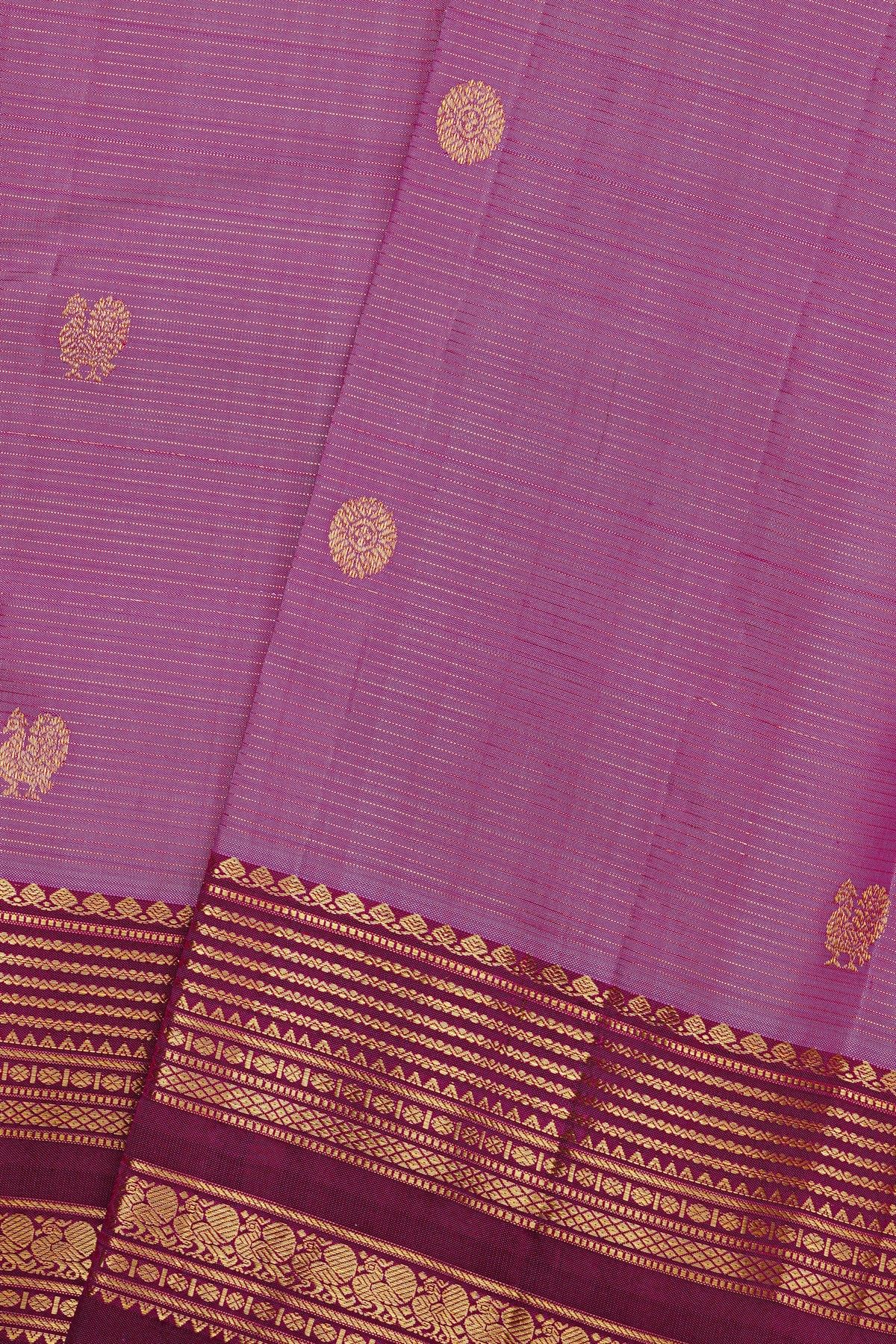 Kancheepuram Silk Pink Saree With Floral And Peacocks Buttis Body