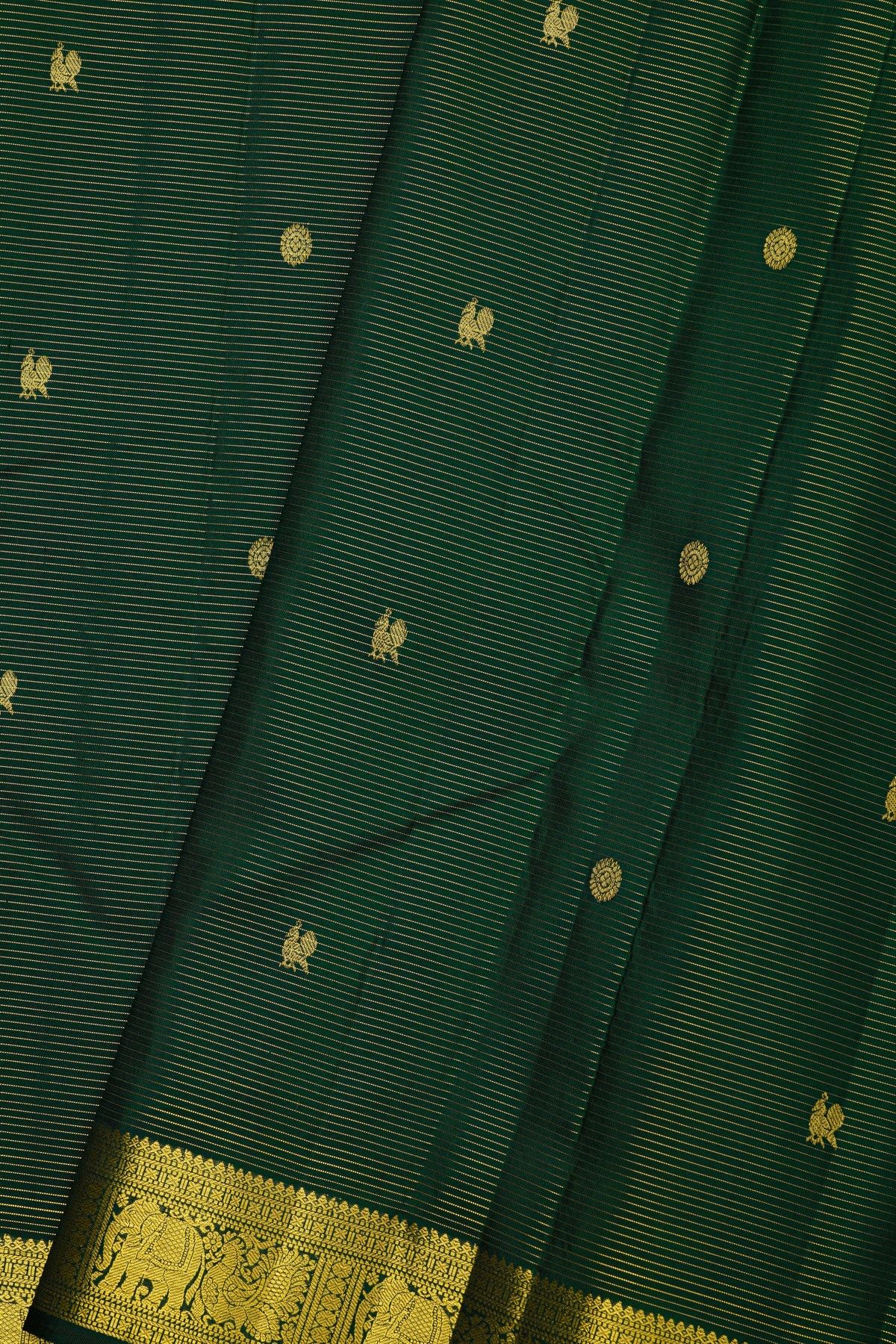 Kancheepuram Silk Bottle Green Saree With Zari Lines Checks Florals And Peacock Buttis Body