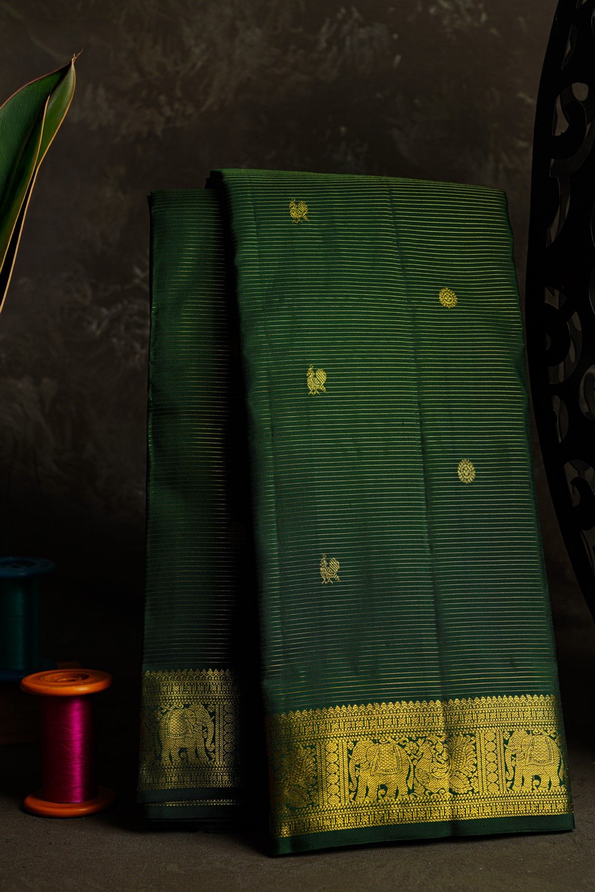 Kancheepuram Silk Bottle Green Saree With Zari Lines And Buttis Body
