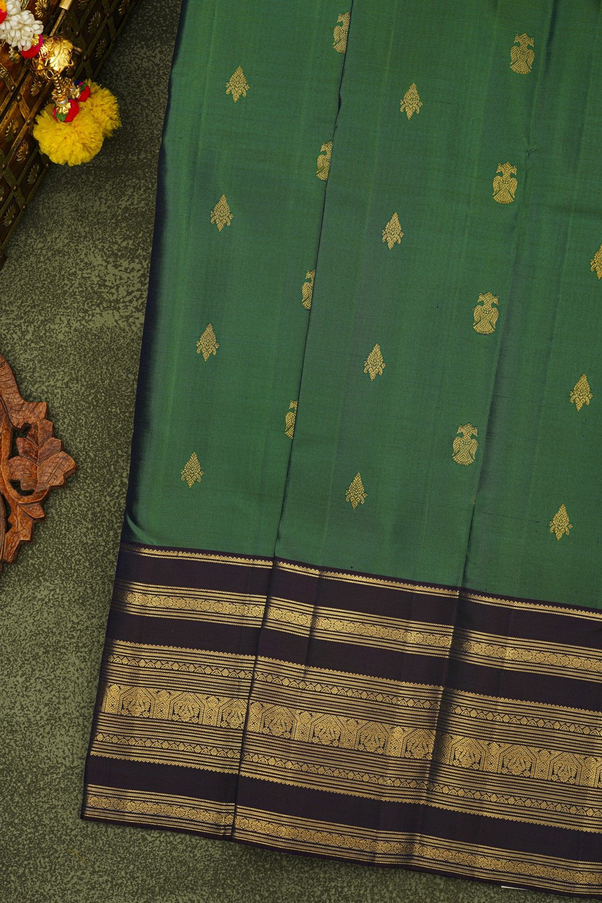 Kancheepuram Silk Bottle Green Saree With Florals And Gandaberunda Buttis Body