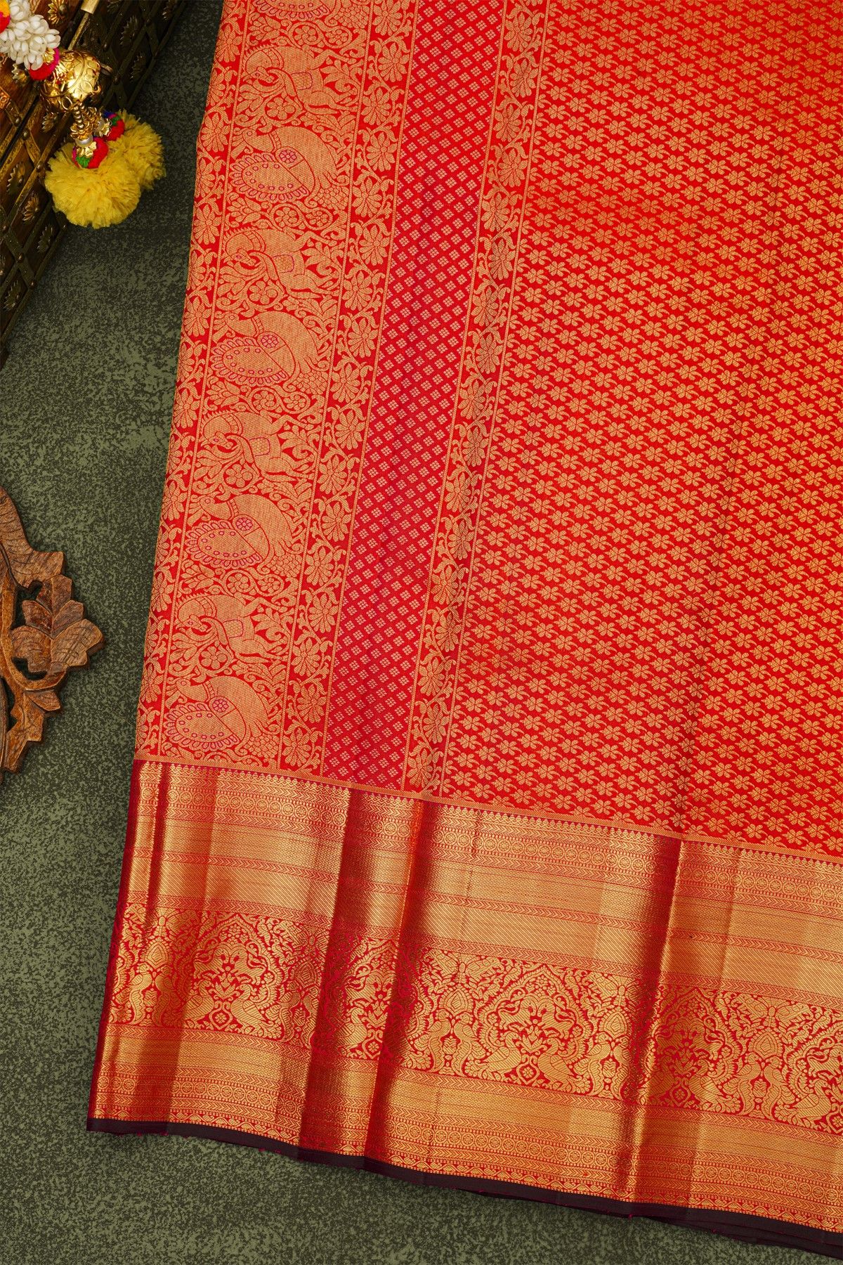 Kancheepuram Silk Red Saree With Zari Checks And Peacock Buttis Body