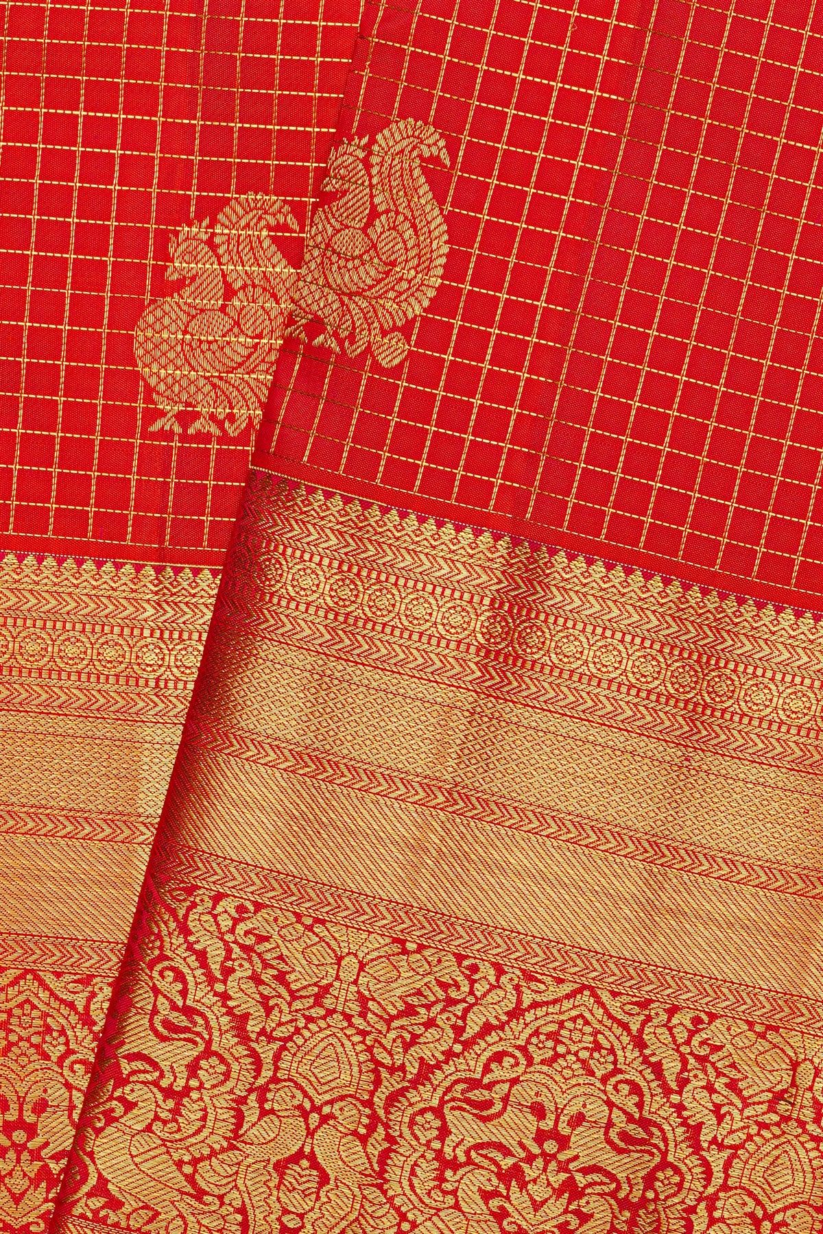 Kancheepuram Silk Red Saree With Zari Checks And Peacock Buttis Body
