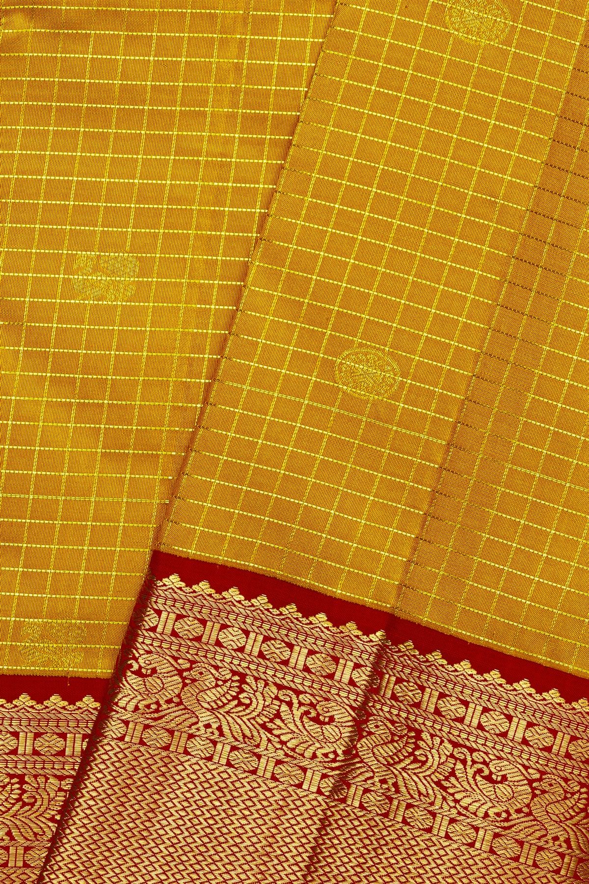 Kancheepuram Silk Mustard Yellow Saree With Zari Checks Diamonds And Peacock Border
