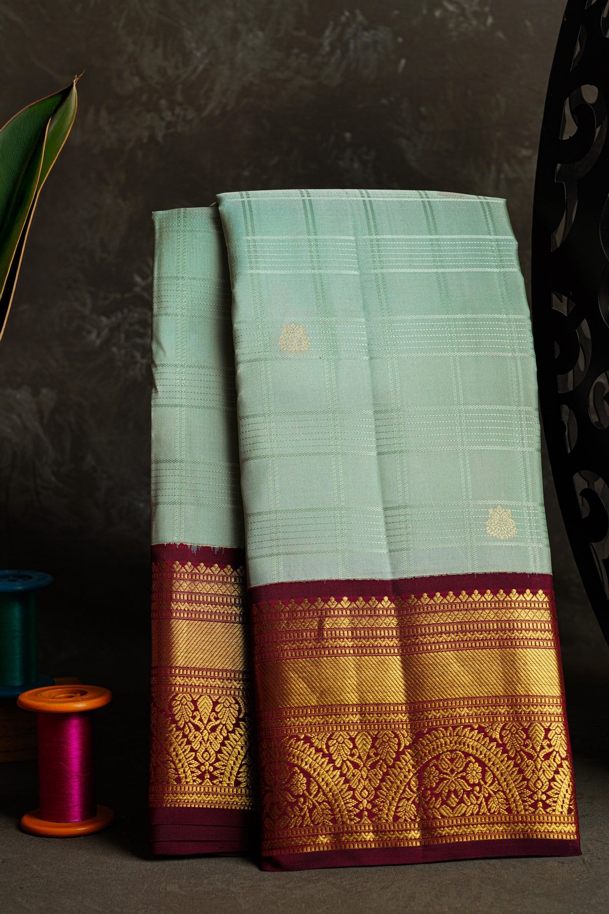 Kancheepuram Silk Sea Green Saree With Peacock Buttis In Zari Checks Body
