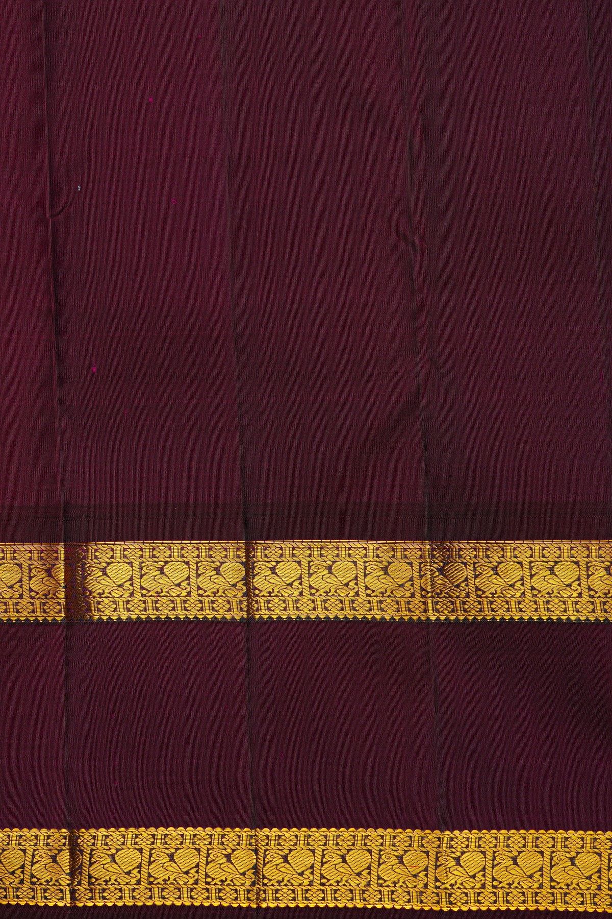 Kancheepuram Silk Sky Blue Saree With Zari Checks And Floral Buttis Body And Gap Border