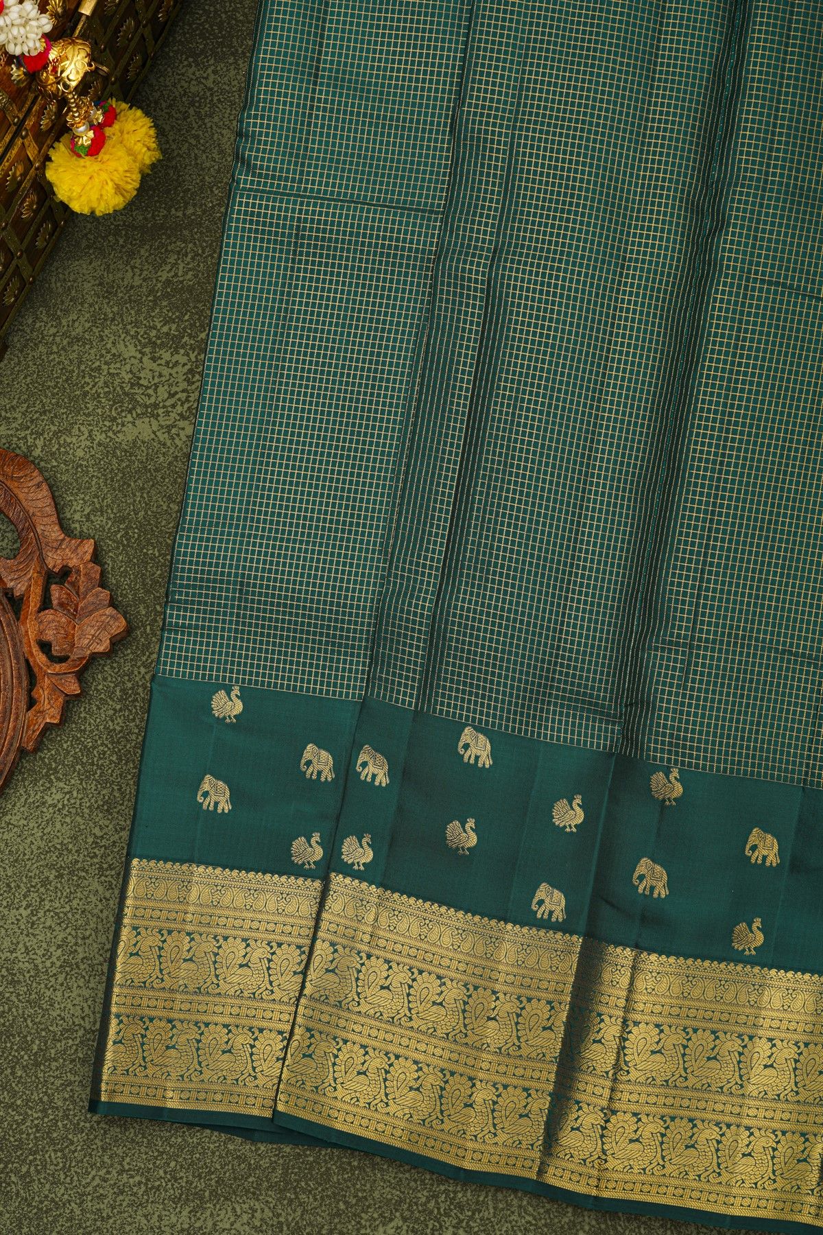 Kancheepuram Silk Bottle Green Saree With Zari Lines And Peacocks Border