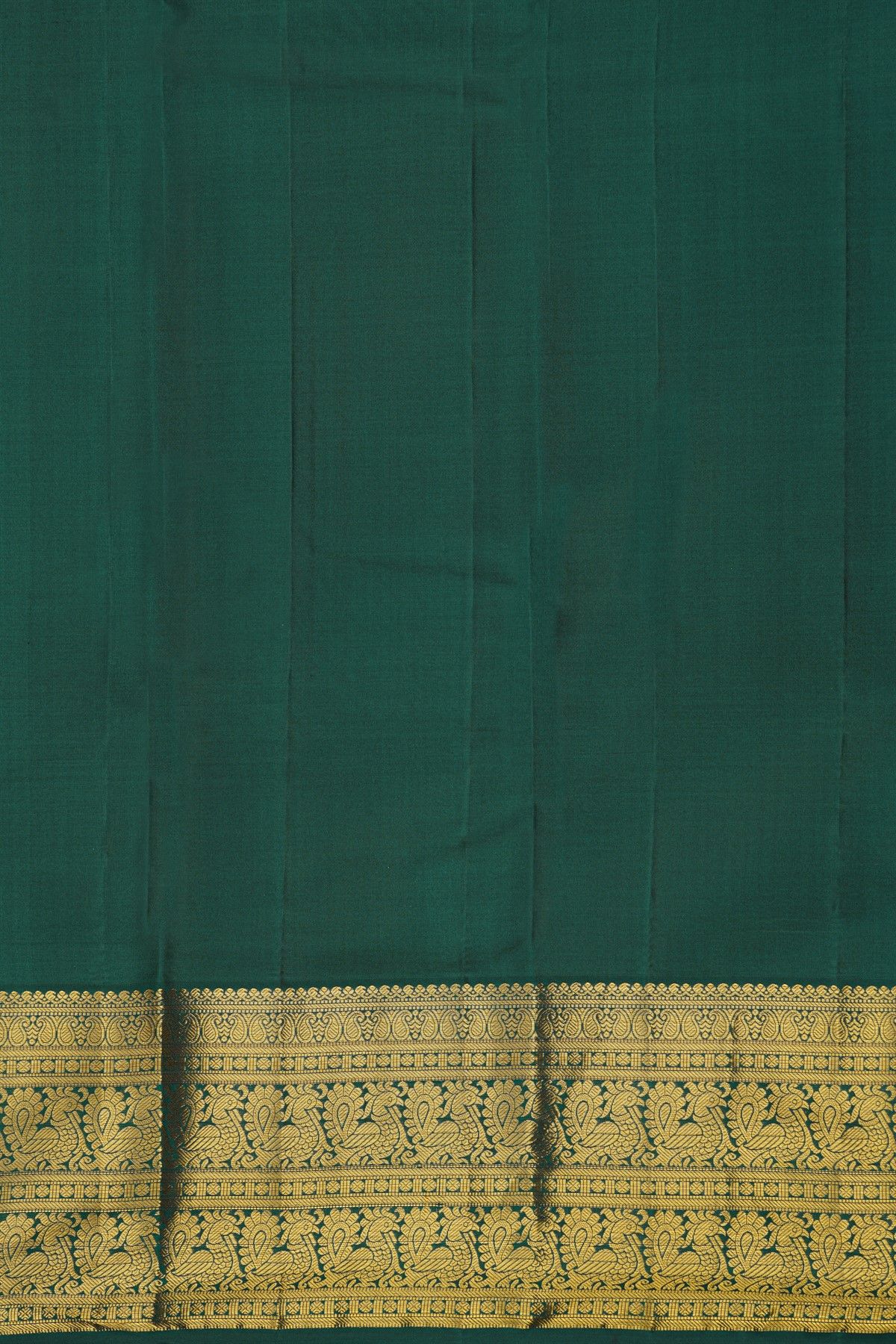 Kancheepuram Silk Bottle Green Saree With Zari Lines And Peacocks Border