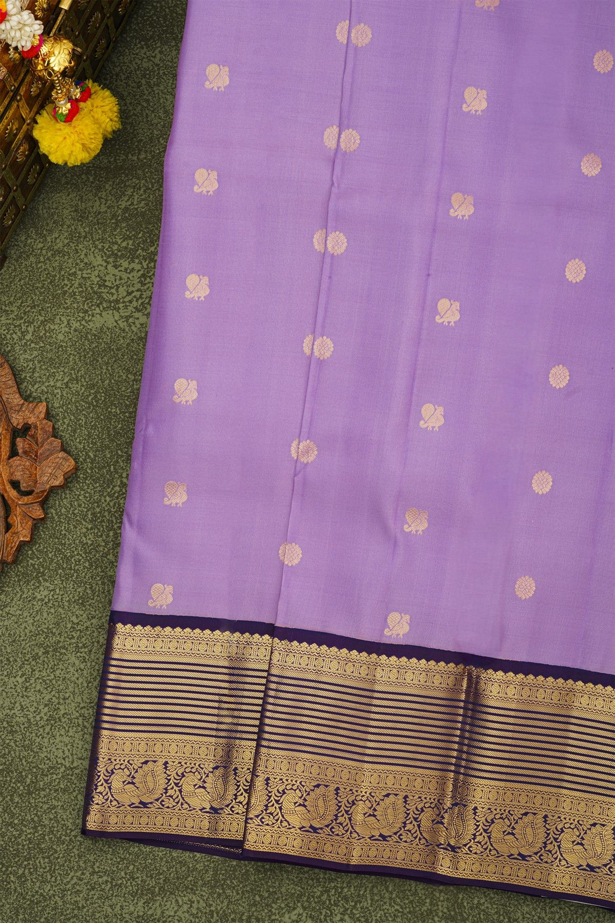 Kancheepuram Silk Lavender Saree With Floral And Peacock Buttis Body