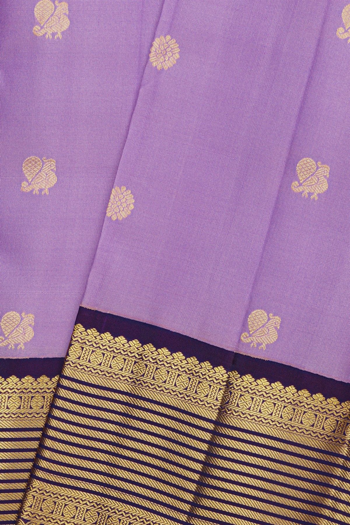 Kancheepuram Silk Lavender Saree With Floral And Peacock Buttis Body