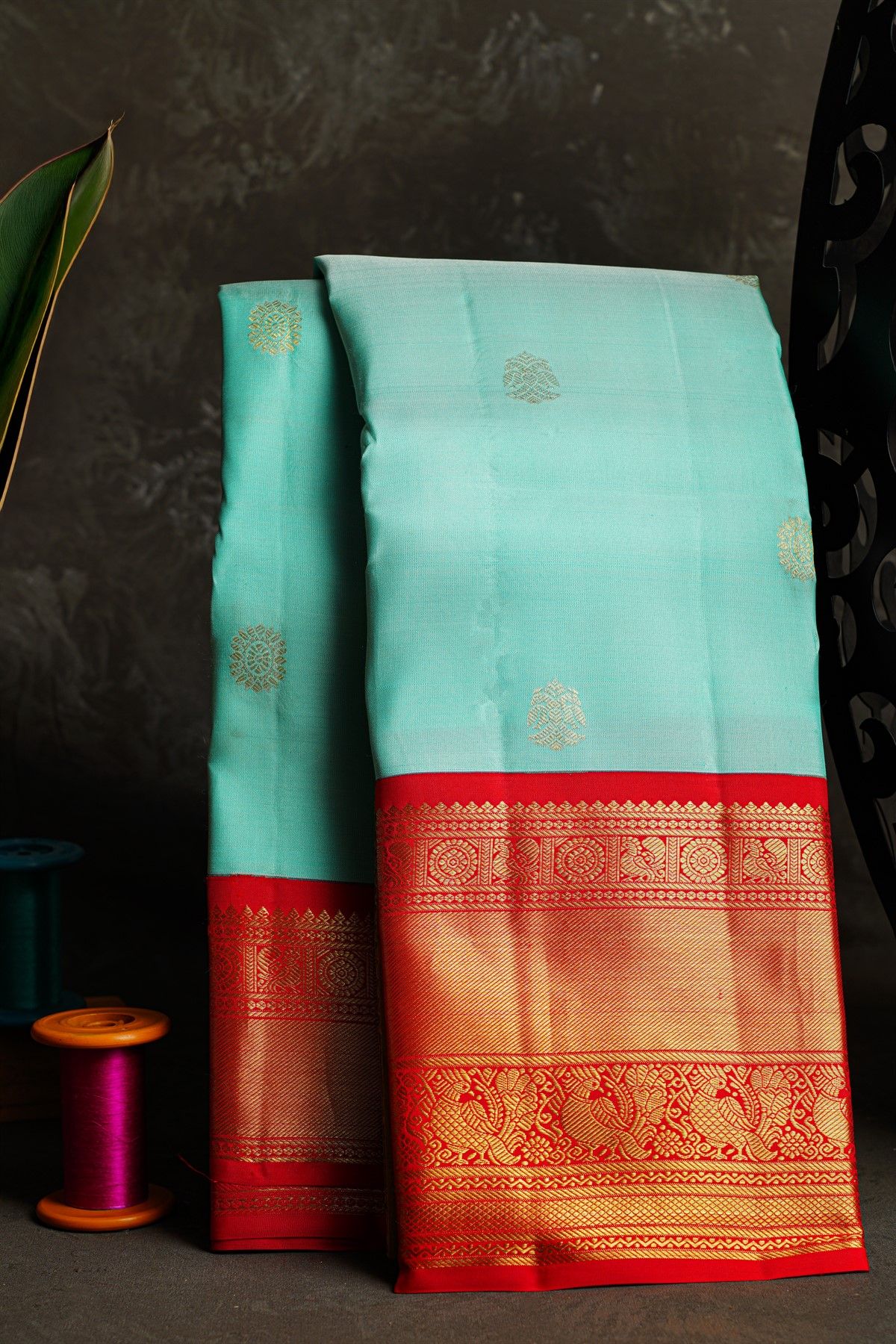 Kancheepuram Silk Sky Blue Saree With Rudraksha Buttis Body And Traditional Border