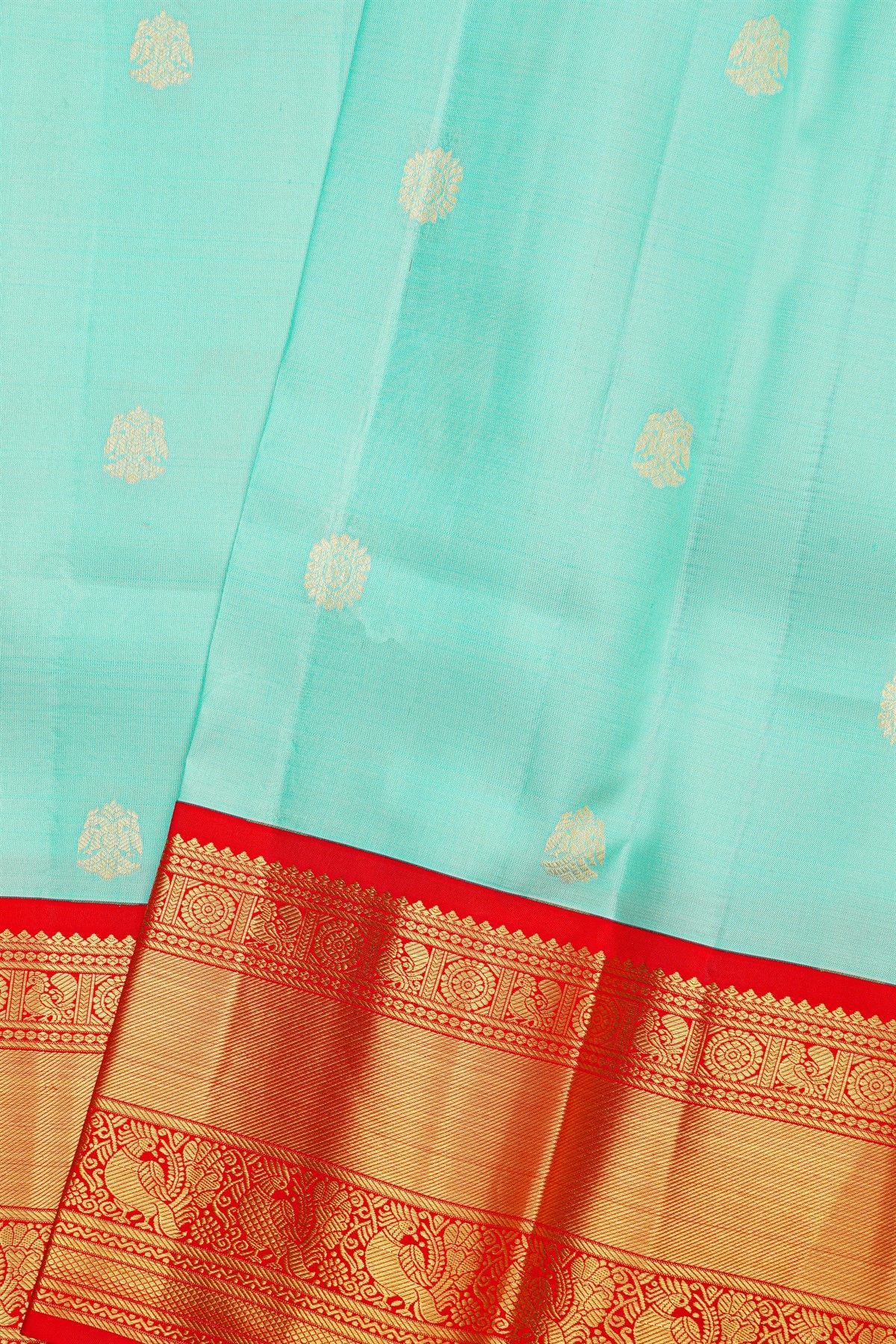 Kancheepuram Silk Sky Blue Saree With Rudraksha Buttis Body And Traditional Border