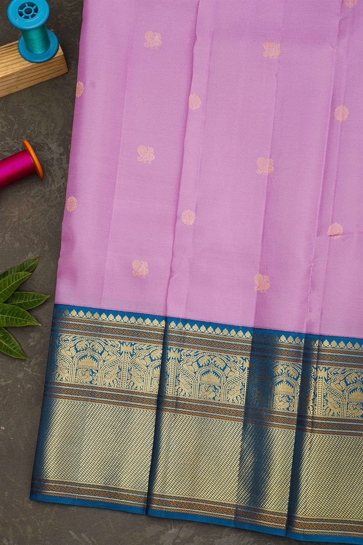 Kancheepuram Silk Lavender Saree With Florals And Peacock Buttis Body