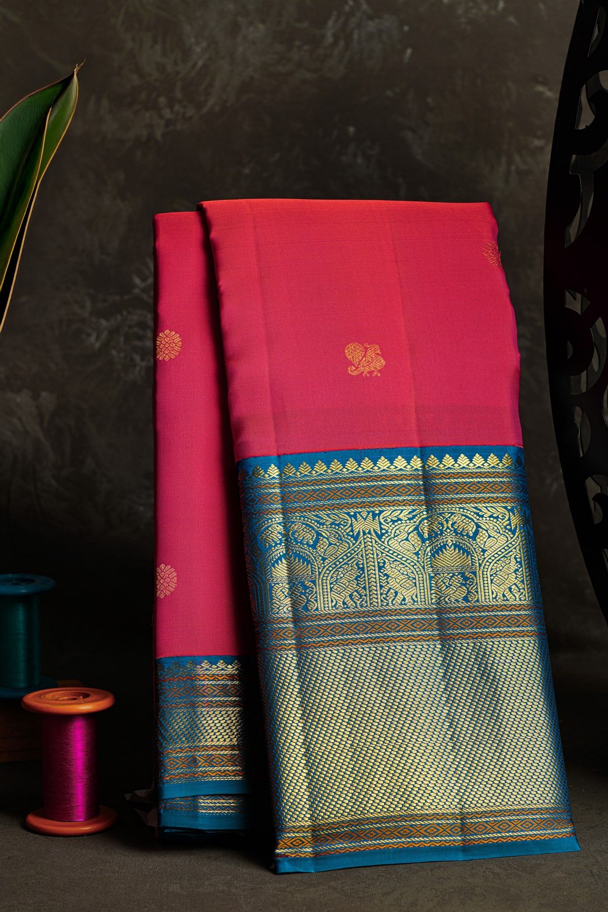 Kancheepuram Silk Rani Pink Saree With Florals And Peacock Buttis Body And Kuttu Border